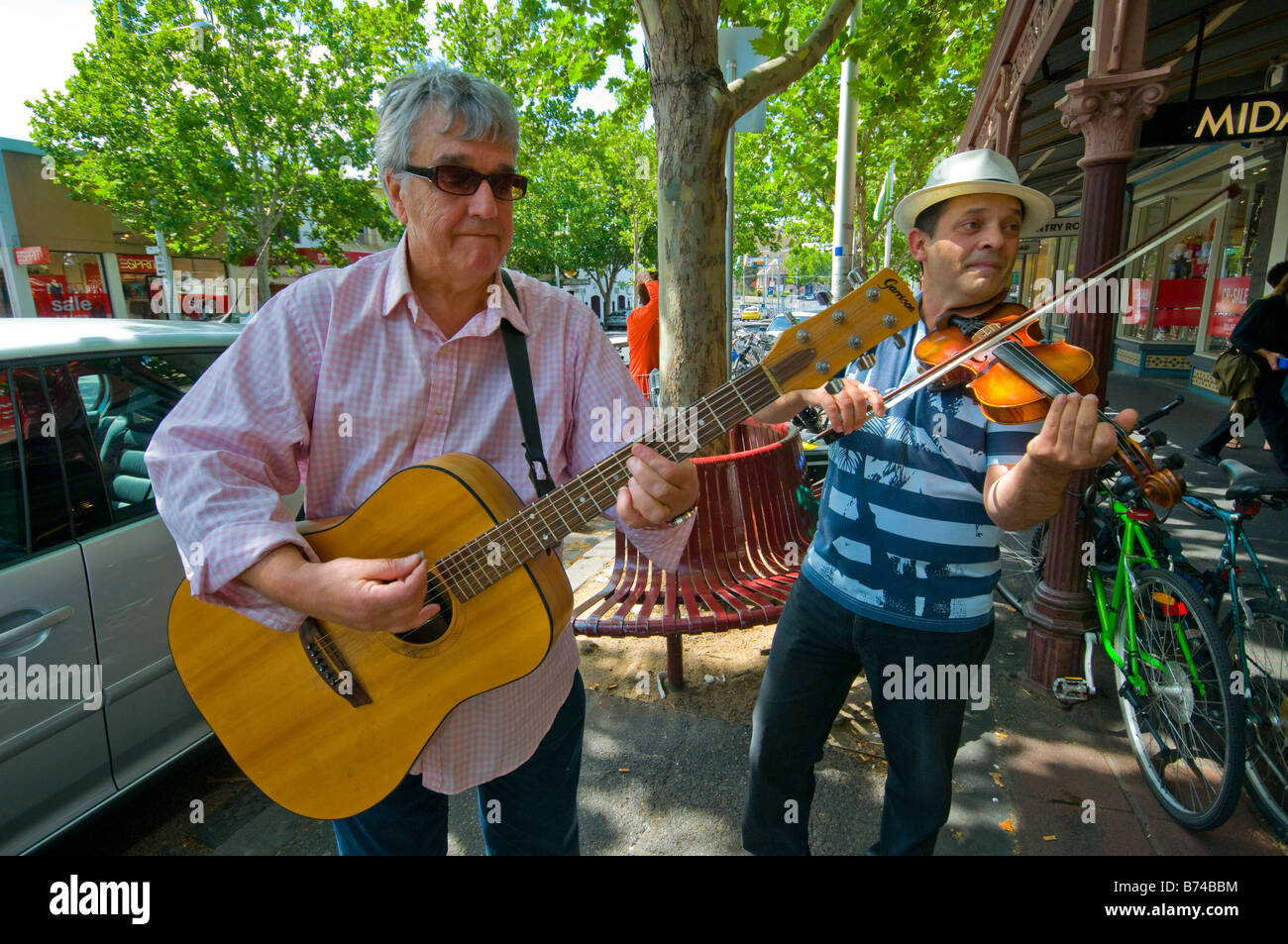 Buskers in Lygon Street Melbourne Australia Stock Photo