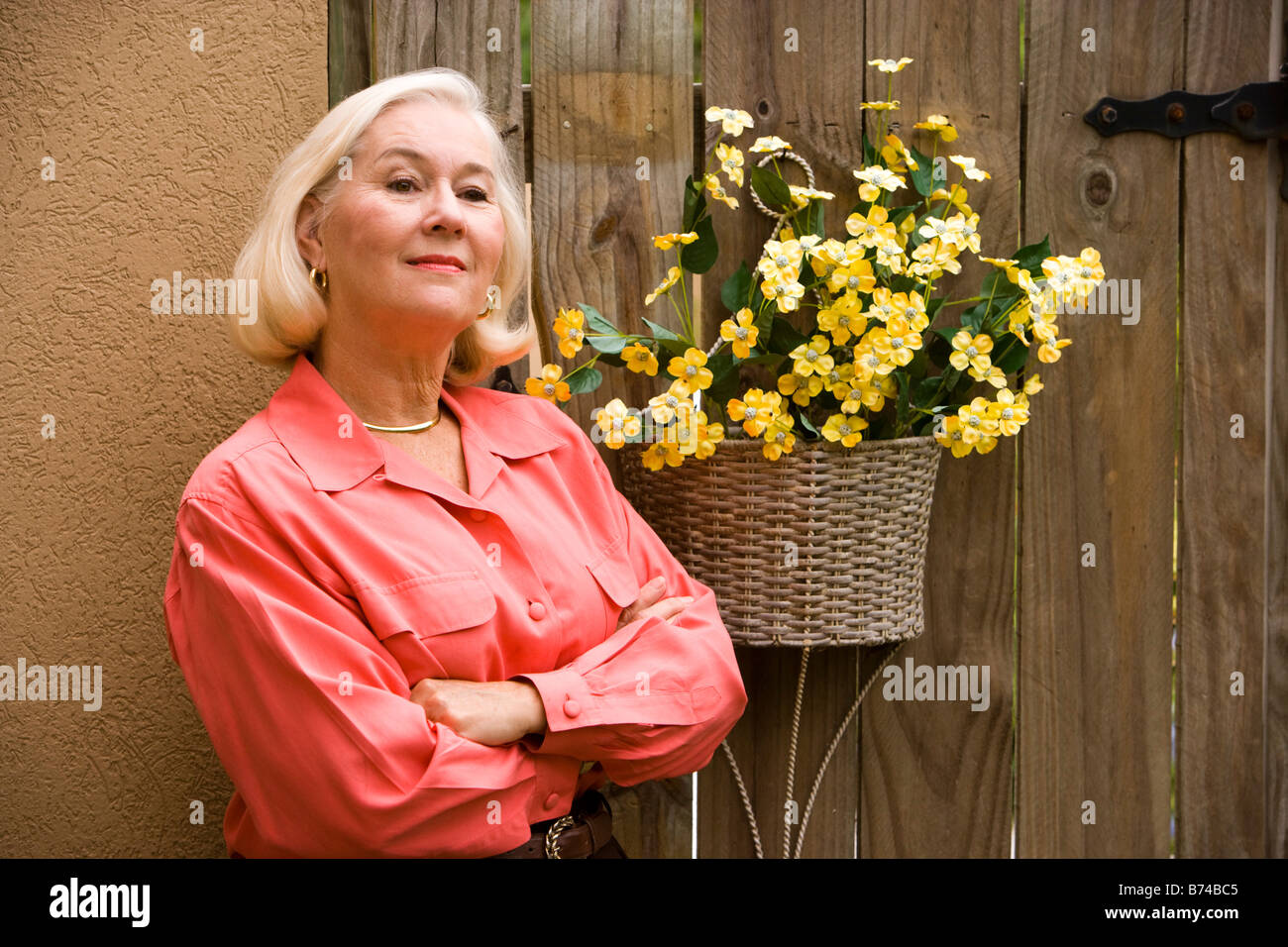 Woman and basket of flowers hi-res stock photography and images - Alamy