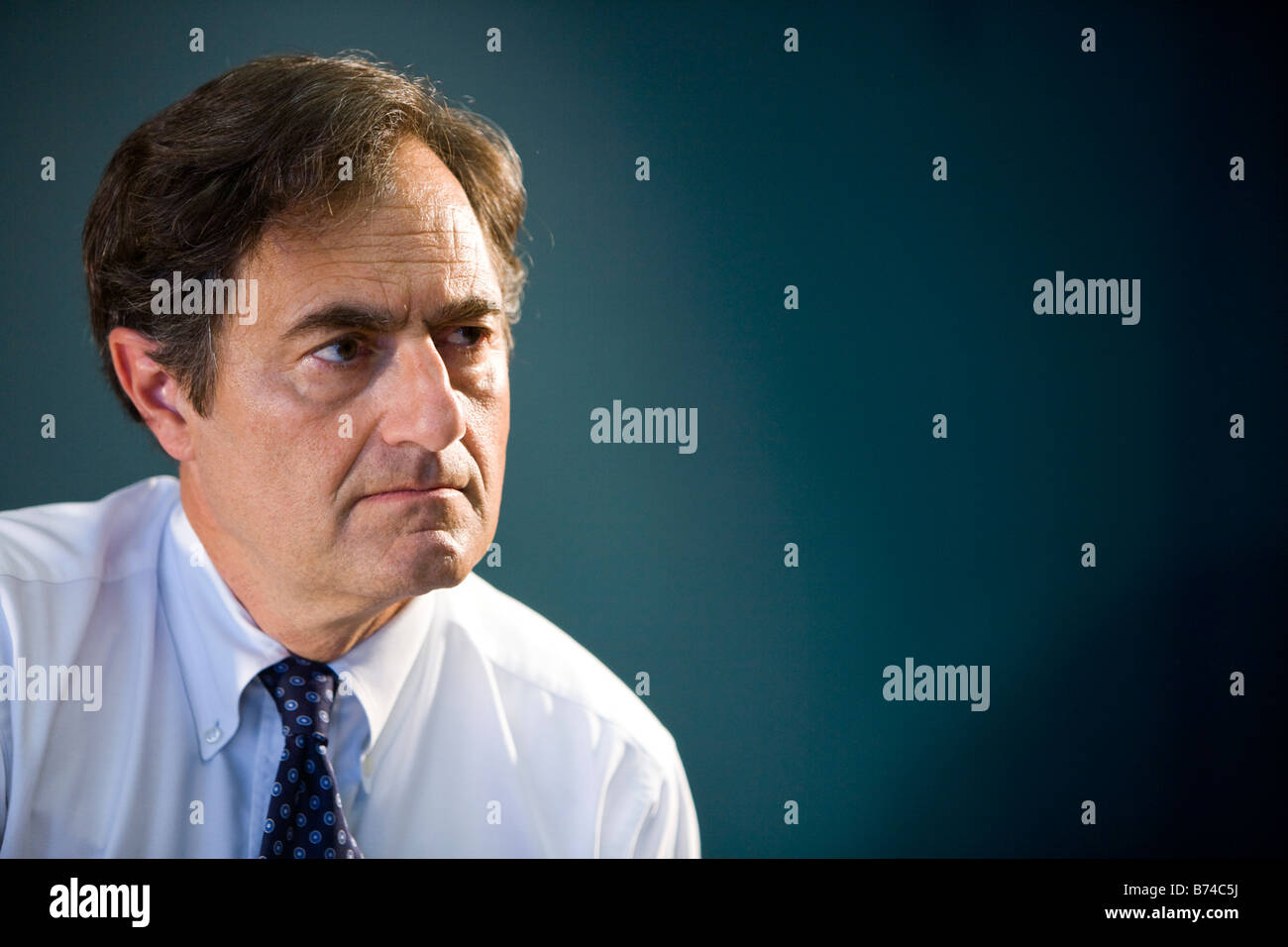 Serious mature boss workplace hi-res stock photography and images - Alamy