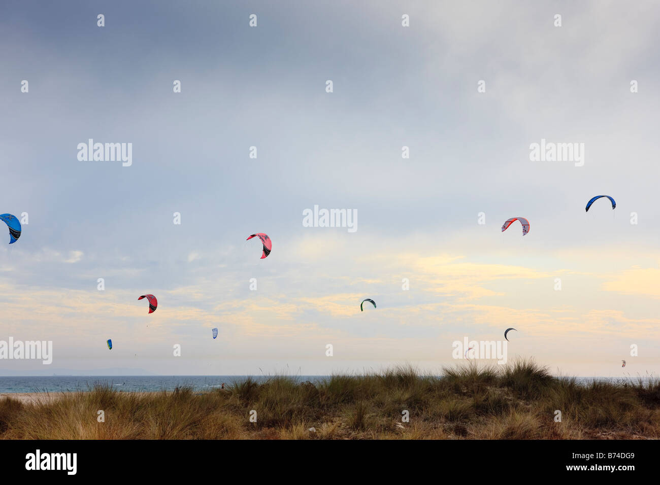 Kites from Kite Surfers against the sky on Playa de Los Lances beach
