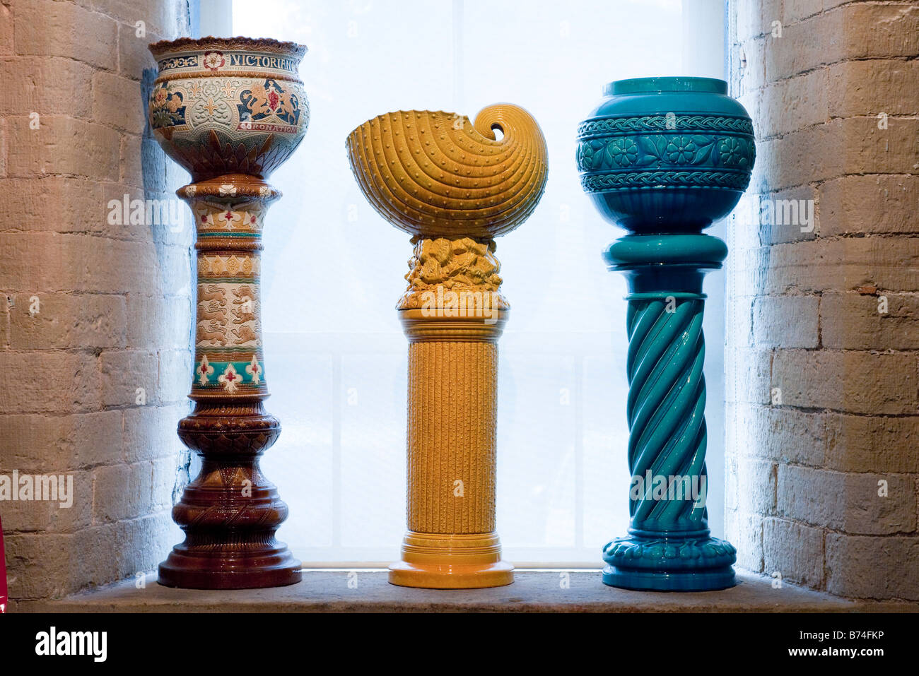 Three jardiniere containers exhibited in  Salts Mill at Shipley Stock Photo