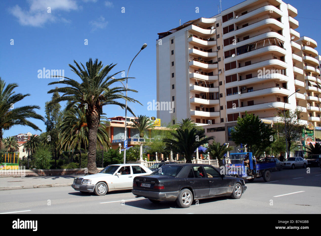 Cars by Apartment Block in the Resort City of Durres/Durresi in Albania Stock Photo