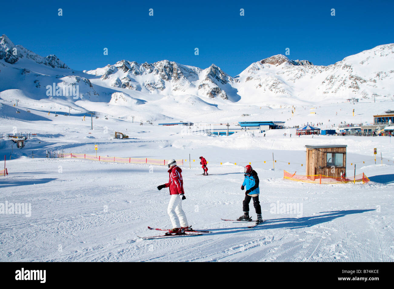 a young boy getting skiing lessons at mountain station Gamsgarten at Stubai Glacier in Tyrol, Austria Stock Photo