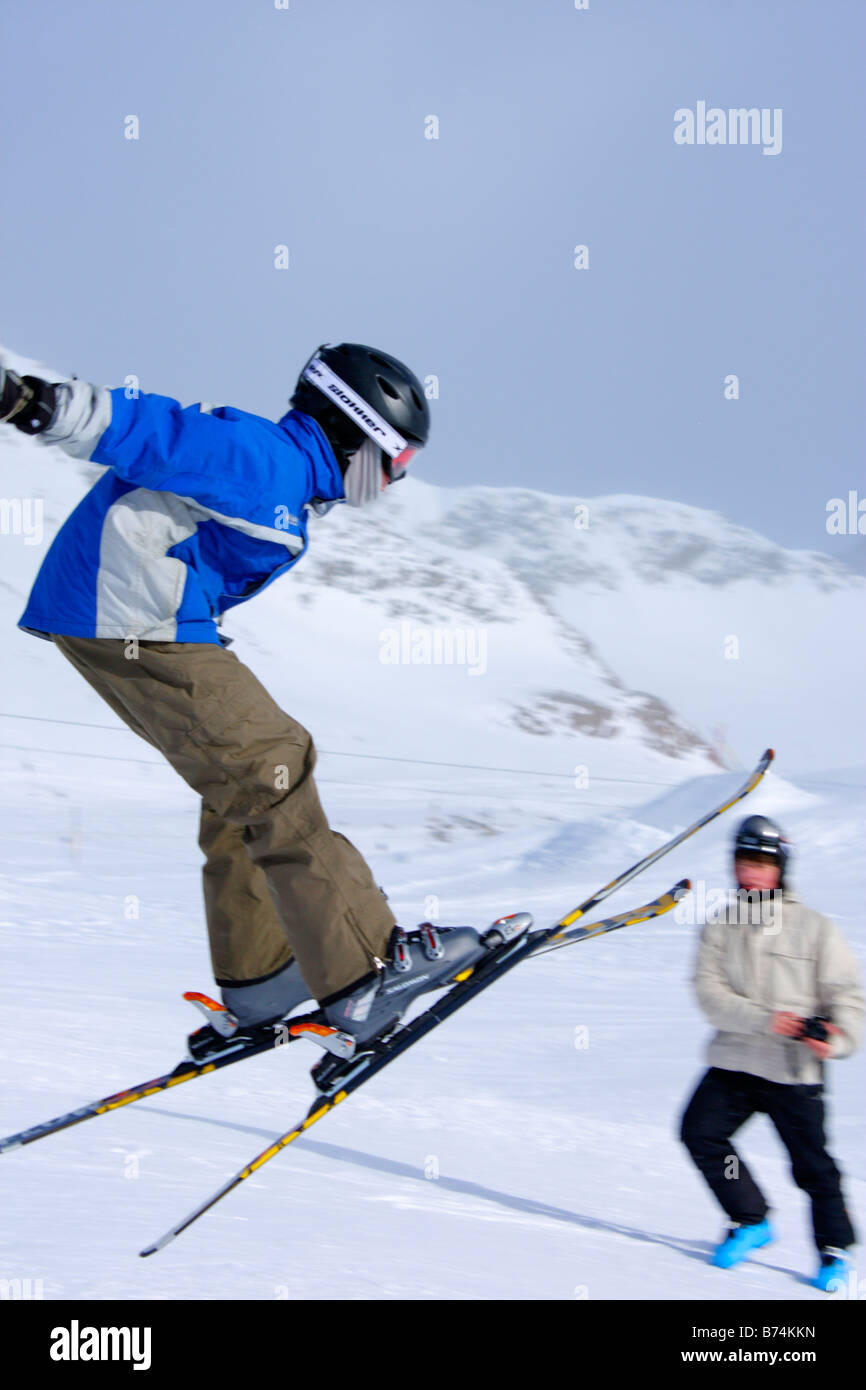 skier jumping at a funpark near mountain station Schaufeljoch on top of Stubai Glacier in Tyrol, Austria Stock Photo