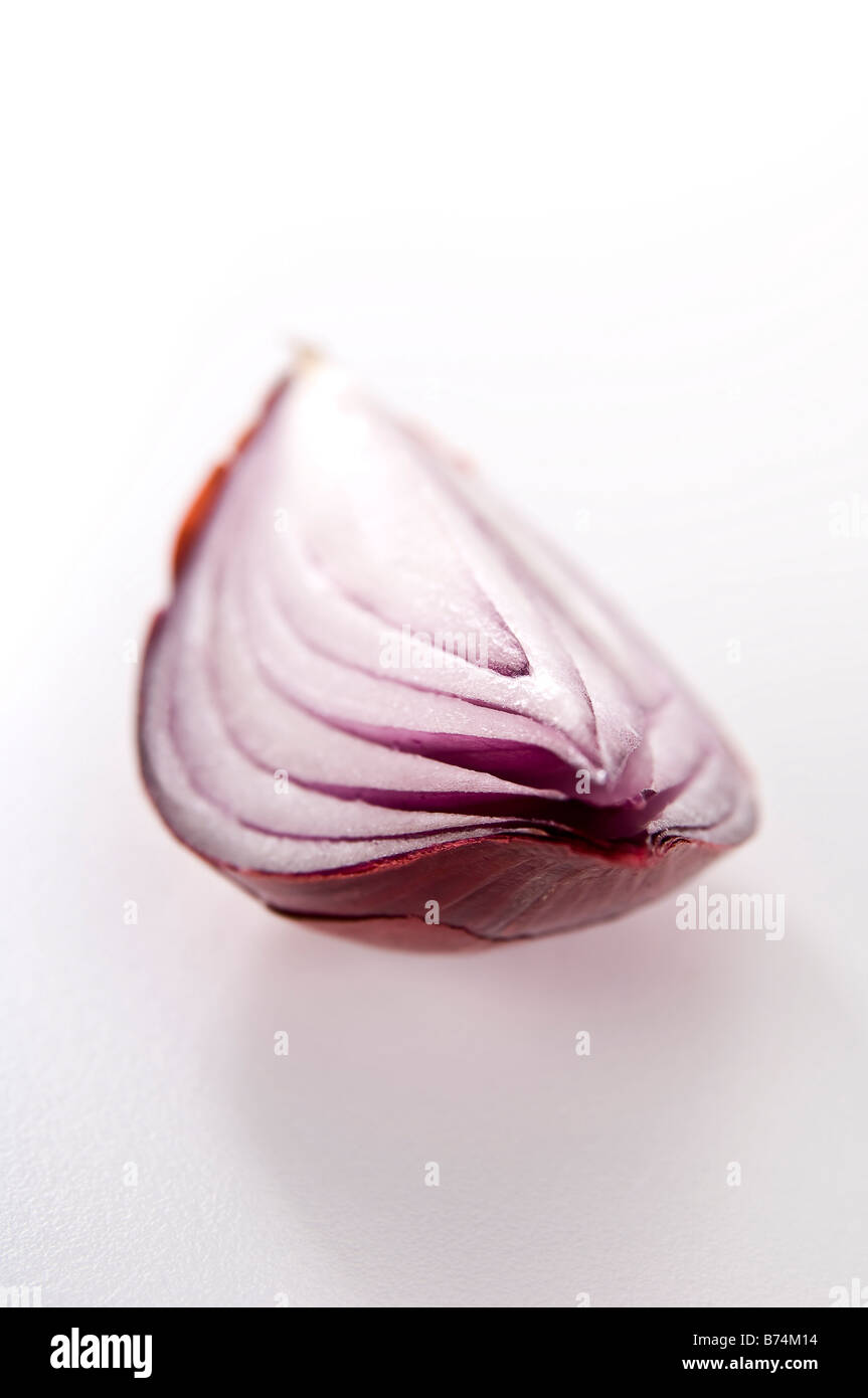 Close-up detail of a quarter of red onion showing the amazing texture. Stock Photo