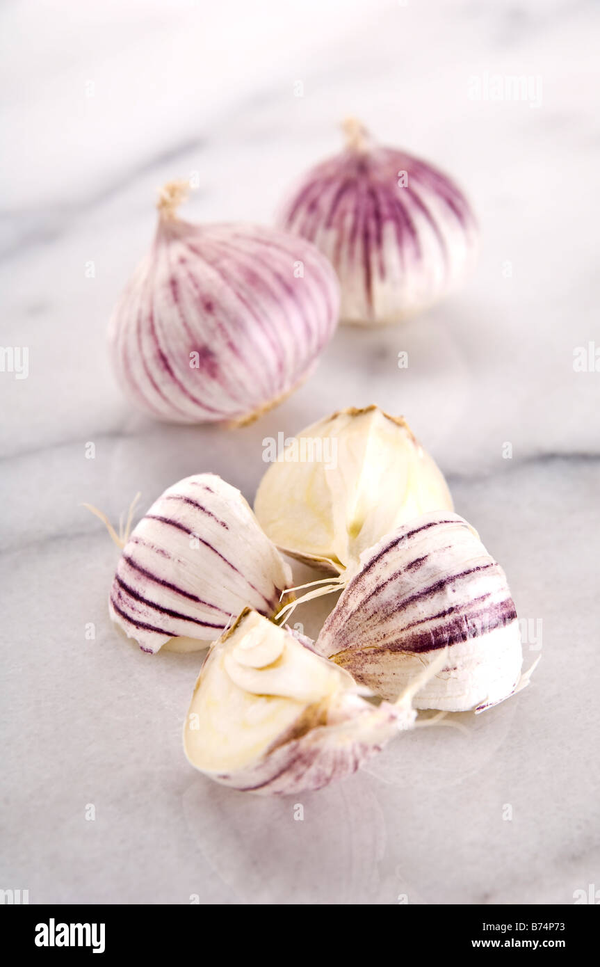 Detail of quartered head of Chinese garlic. Unlike normal garlic, Chinese garlic is one complete bulb - ideal if you cook a lot ! Stock Photo