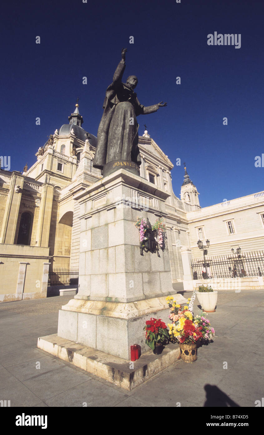 Statue of Pope John Paul II in front of Nuestra Señora de Santa Maria de la Almudena cathedral, Madrid, Spain Stock Photo