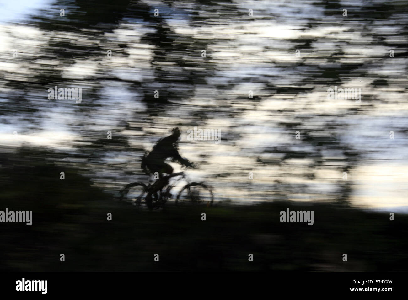 Someone Riding Fast person riding fast bike on rural lane countryside Stock Photo - Alamy