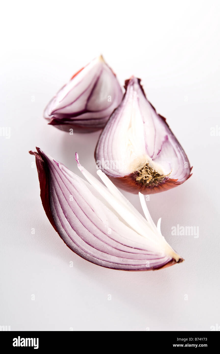 Close-up detail of red onion quarters showing the amazing texture. Stock Photo