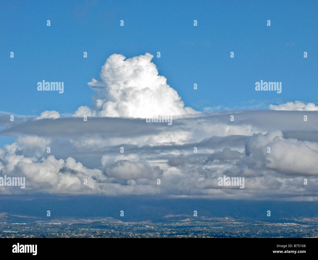 Cumulus castellanus clouds in blue sky Southern California Stock Photo