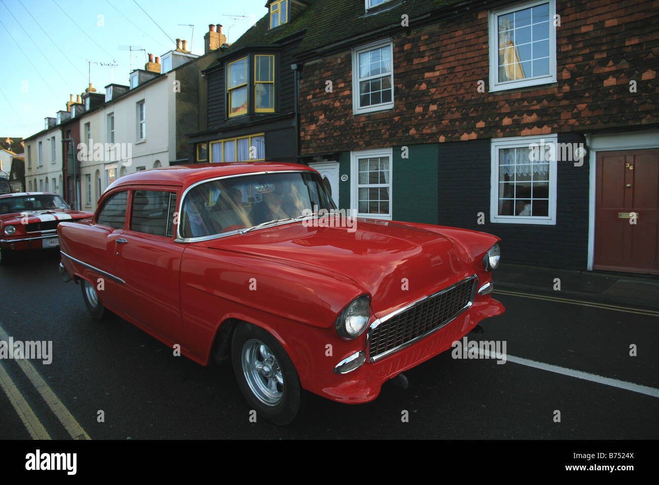 American classic car rally driving the the historic town of Rye, East ...