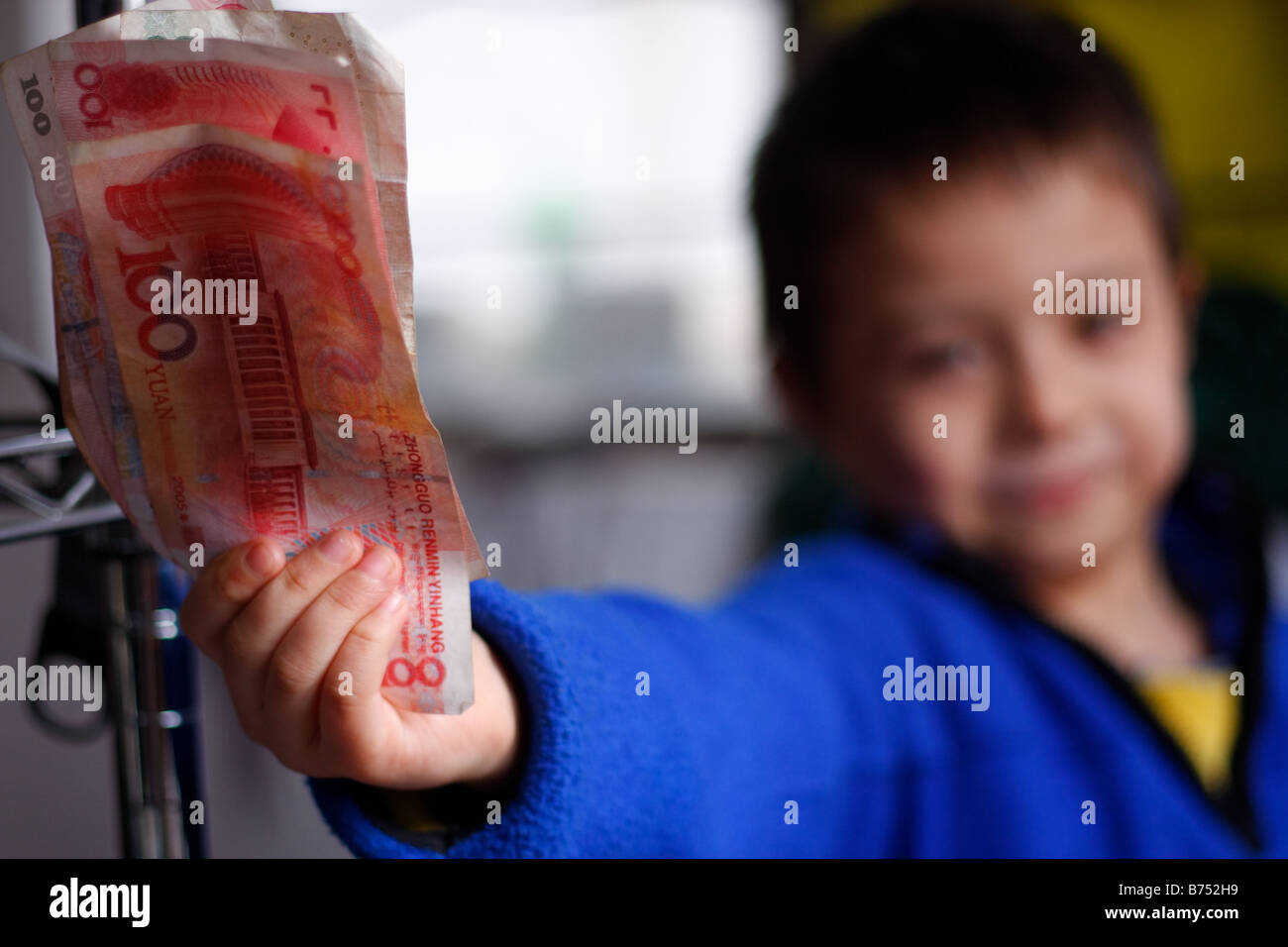6 year old Asian Caucasian Chinese American boy playing with Chinese