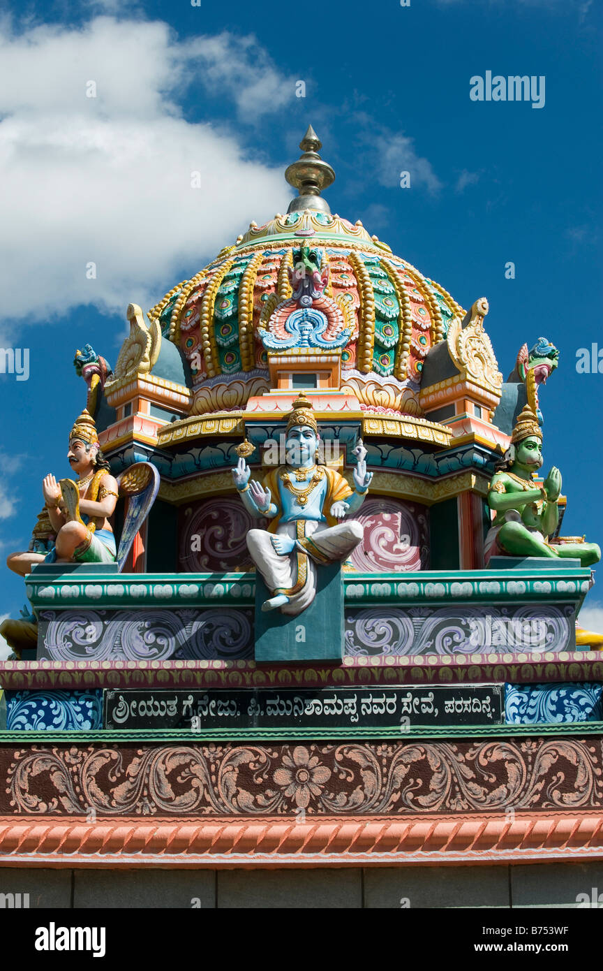 Hindu temple architecture against blue sky. South India Stock Photo