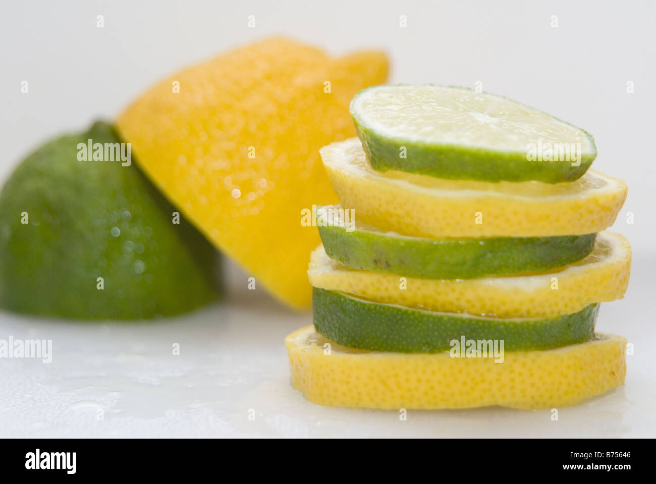 Stacked organic lemons and limes Stock Photo Alamy