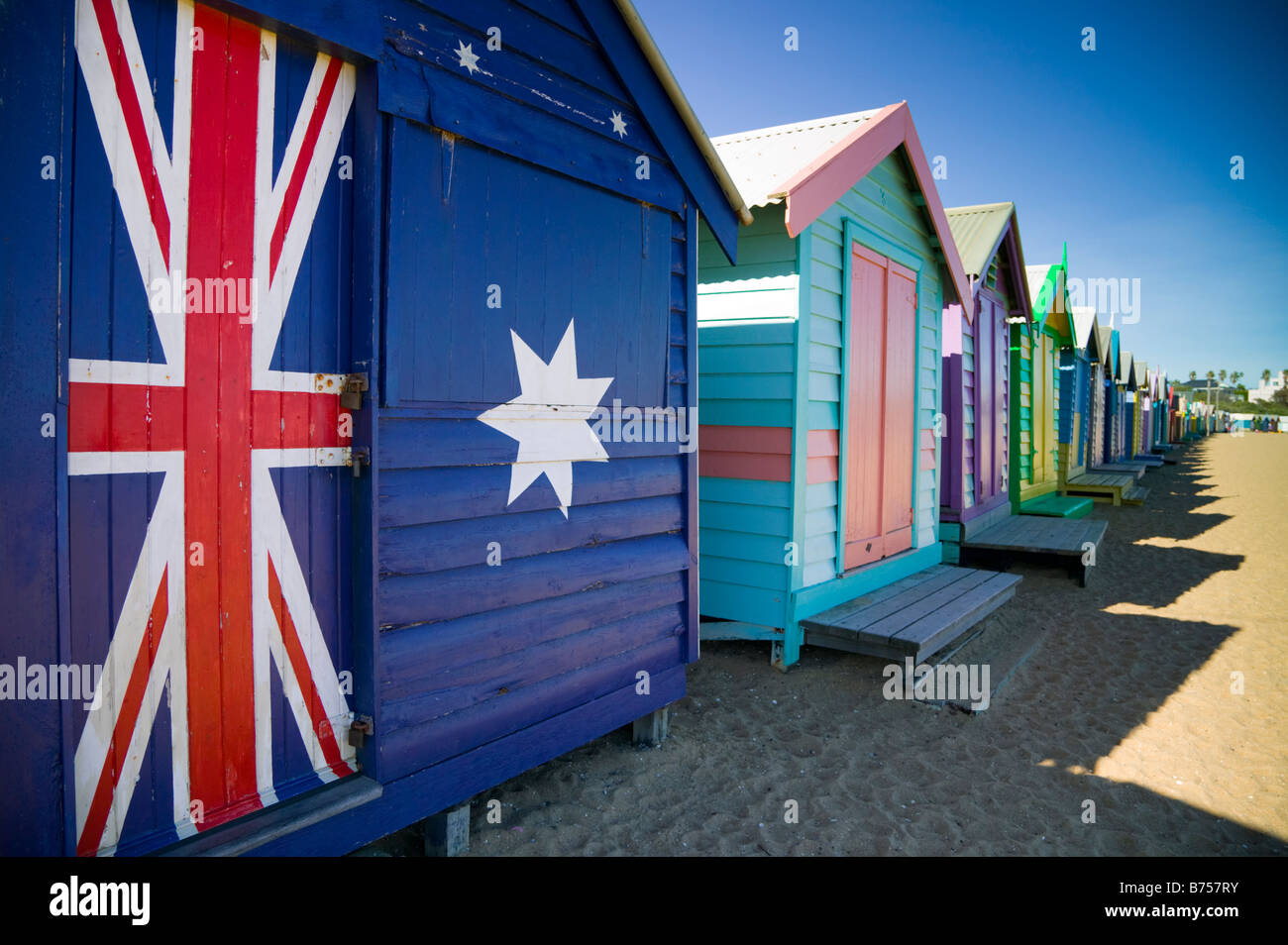 Beautifully-designed bathing boxes line the Dendy Street Beach in Melbourne, Australia. Stock Photo