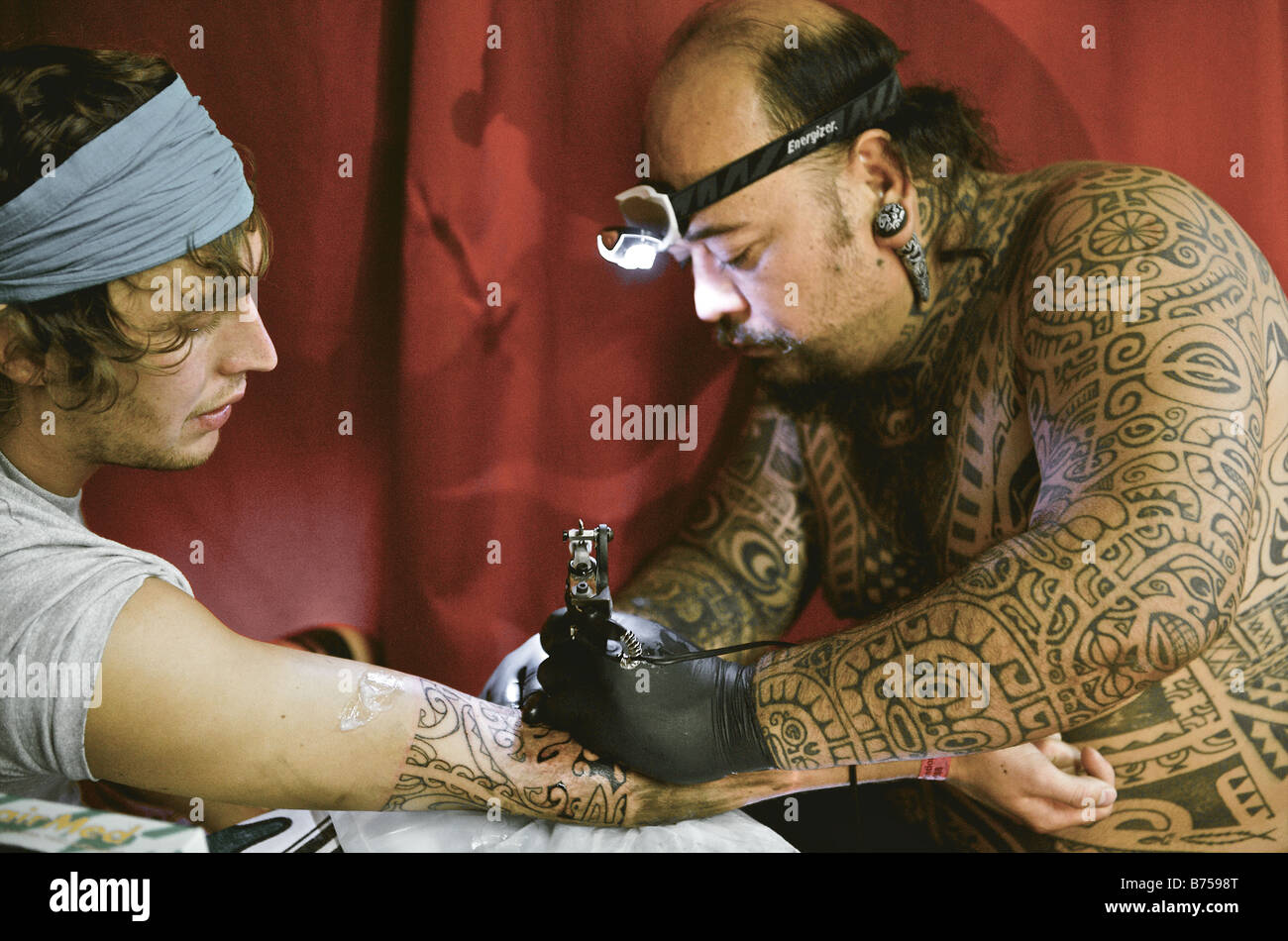 Amsterdam a Maori tattoo artist at the Tattoo convention Stock Photo