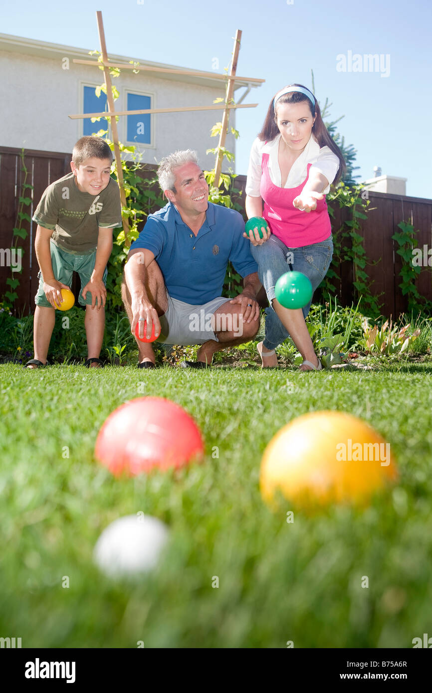 Kid playing bocce ball hires stock photography and images Alamy