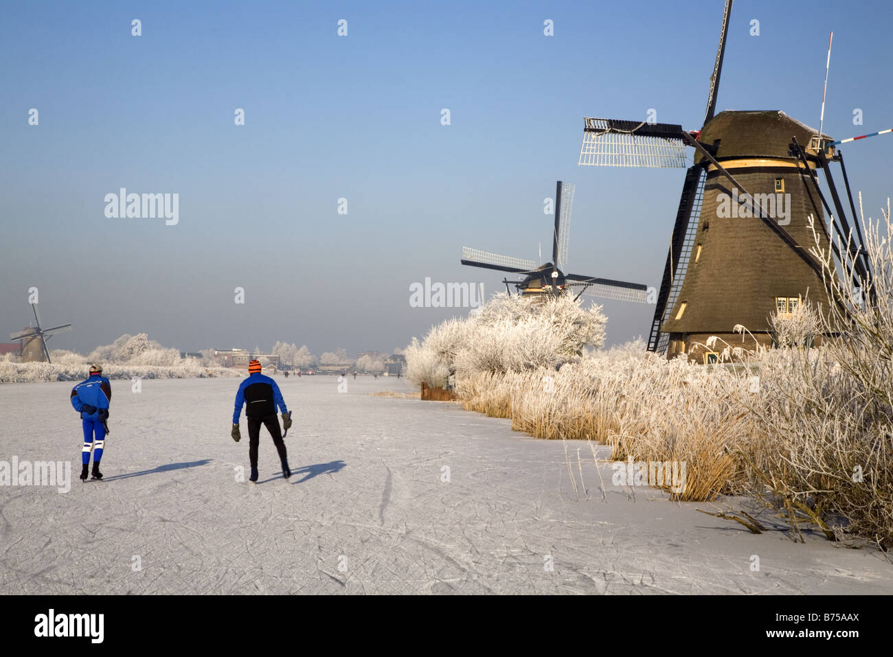 Ice skating in Kinderdijk, Holland Stock Photo Alamy