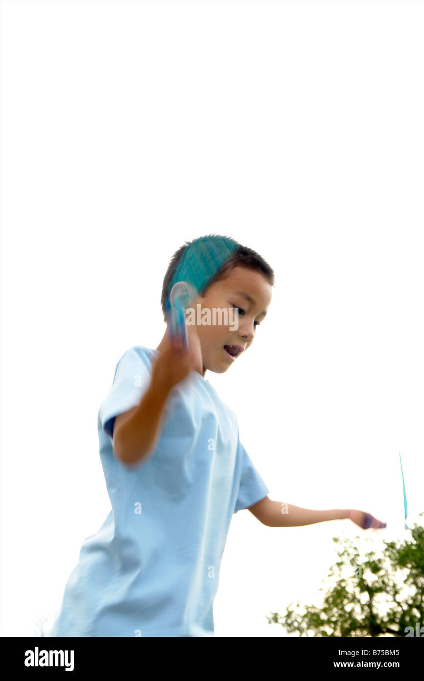 Seven year old boy with skipping rope, Winnipeg, Canada Stock Photo