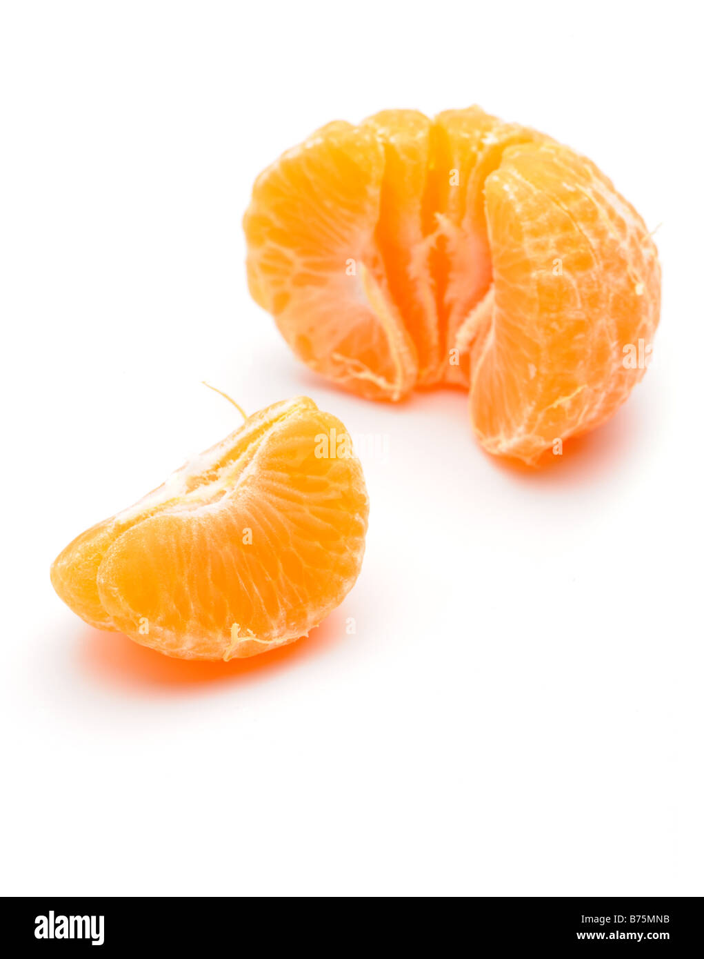 Peeled tangerine on a white background Stock Photo