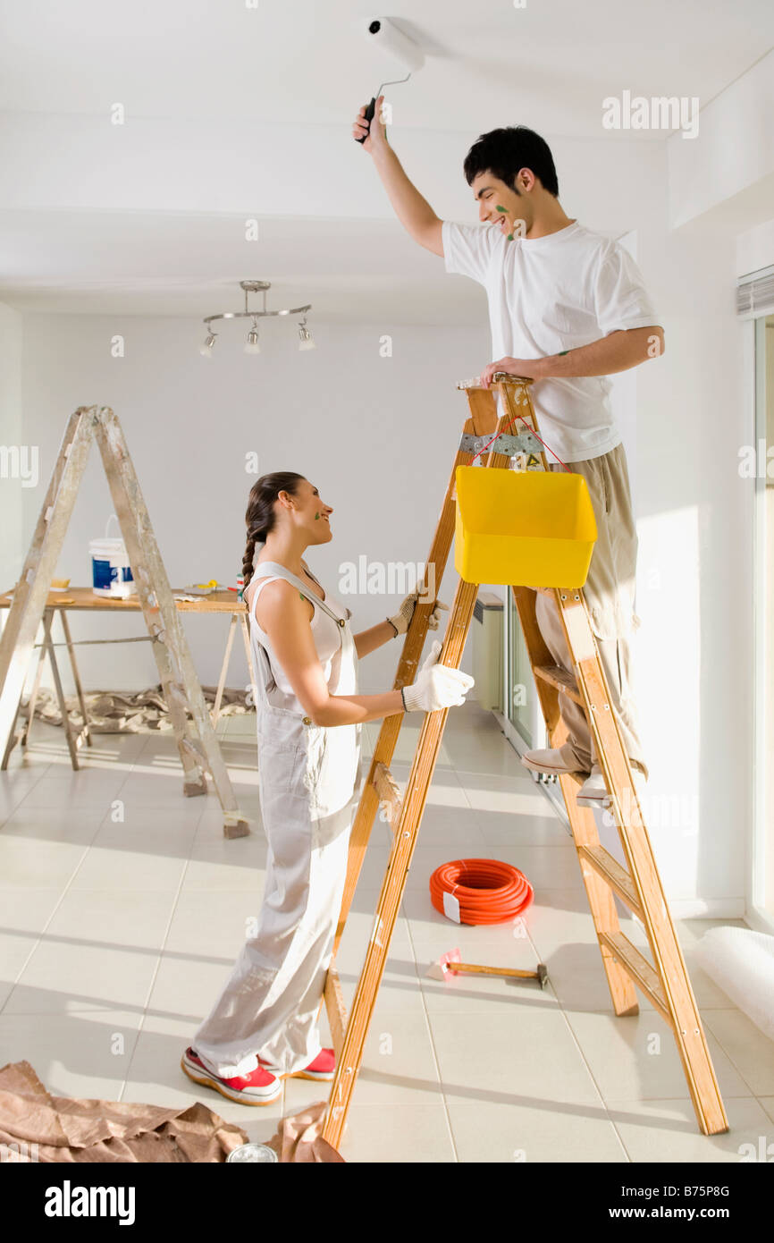 How to Hold Paint on a Ladder 