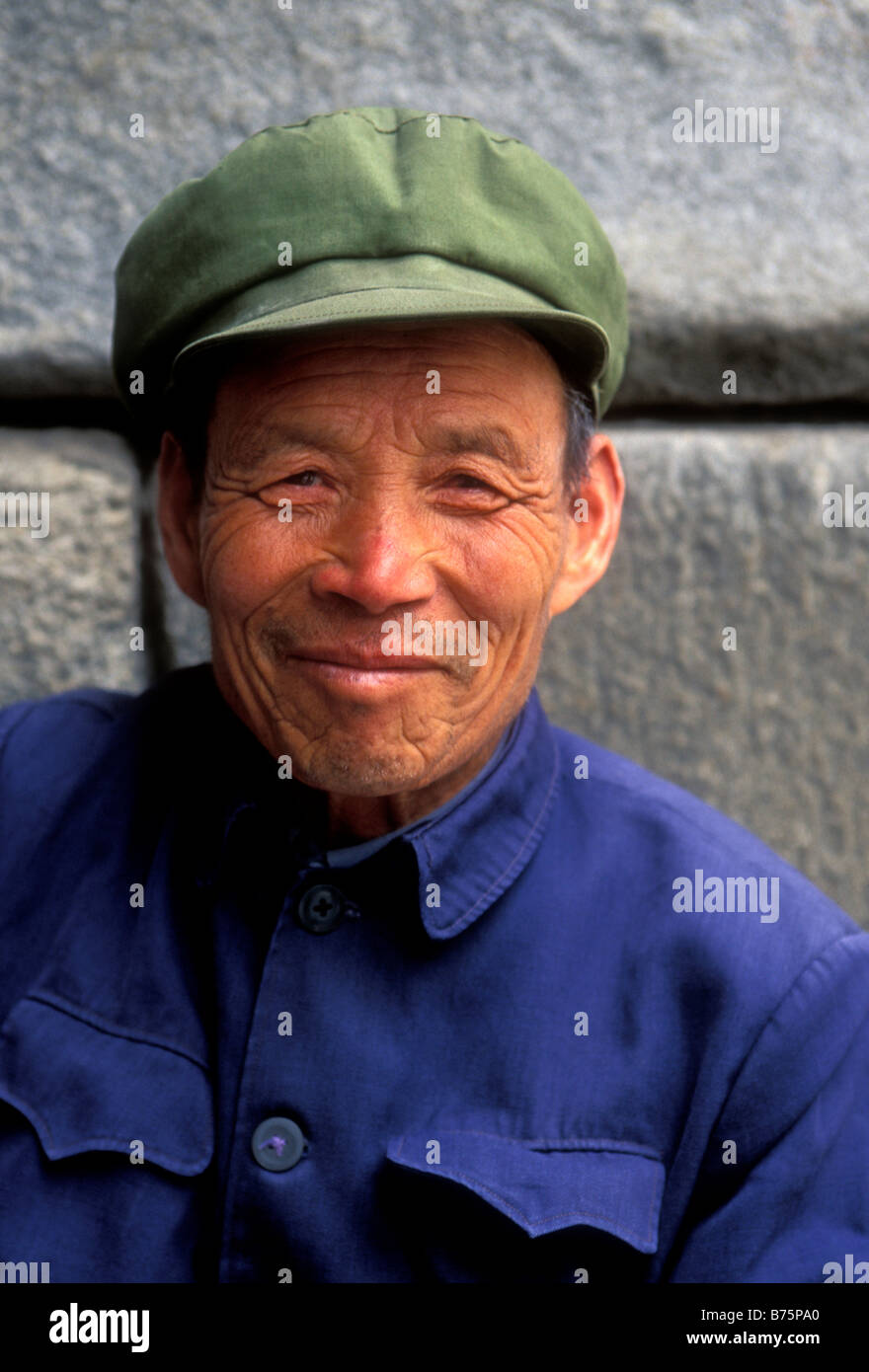 1, one, Chinese man, Chinese, man, adult man, old man, elderly man, eye contact, headshot, smiling, friendly, Xian, Shaanxi Province, China Stock Photo