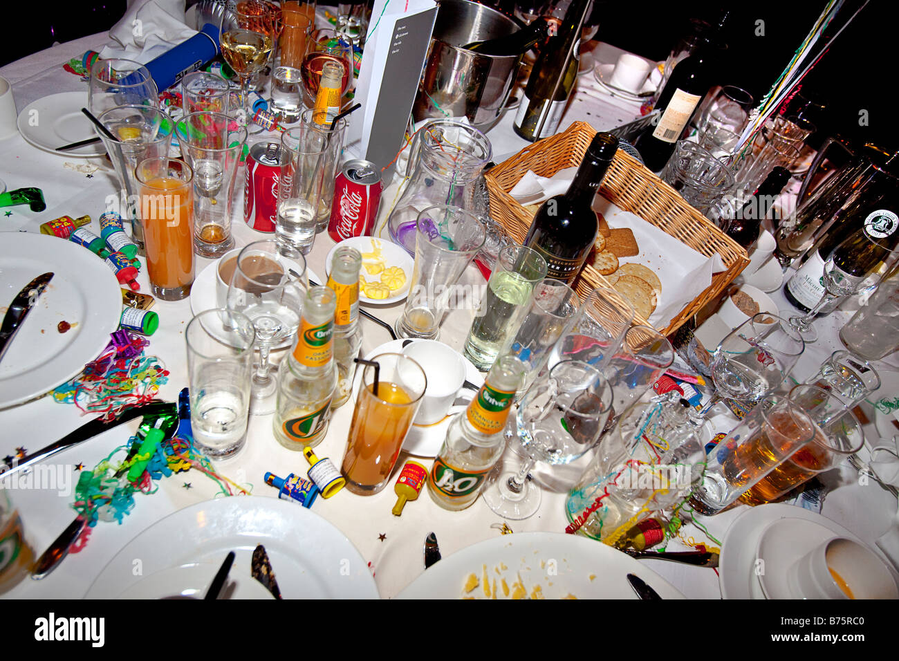After the party A table littered with the after effects of a dinner party Stock Photo