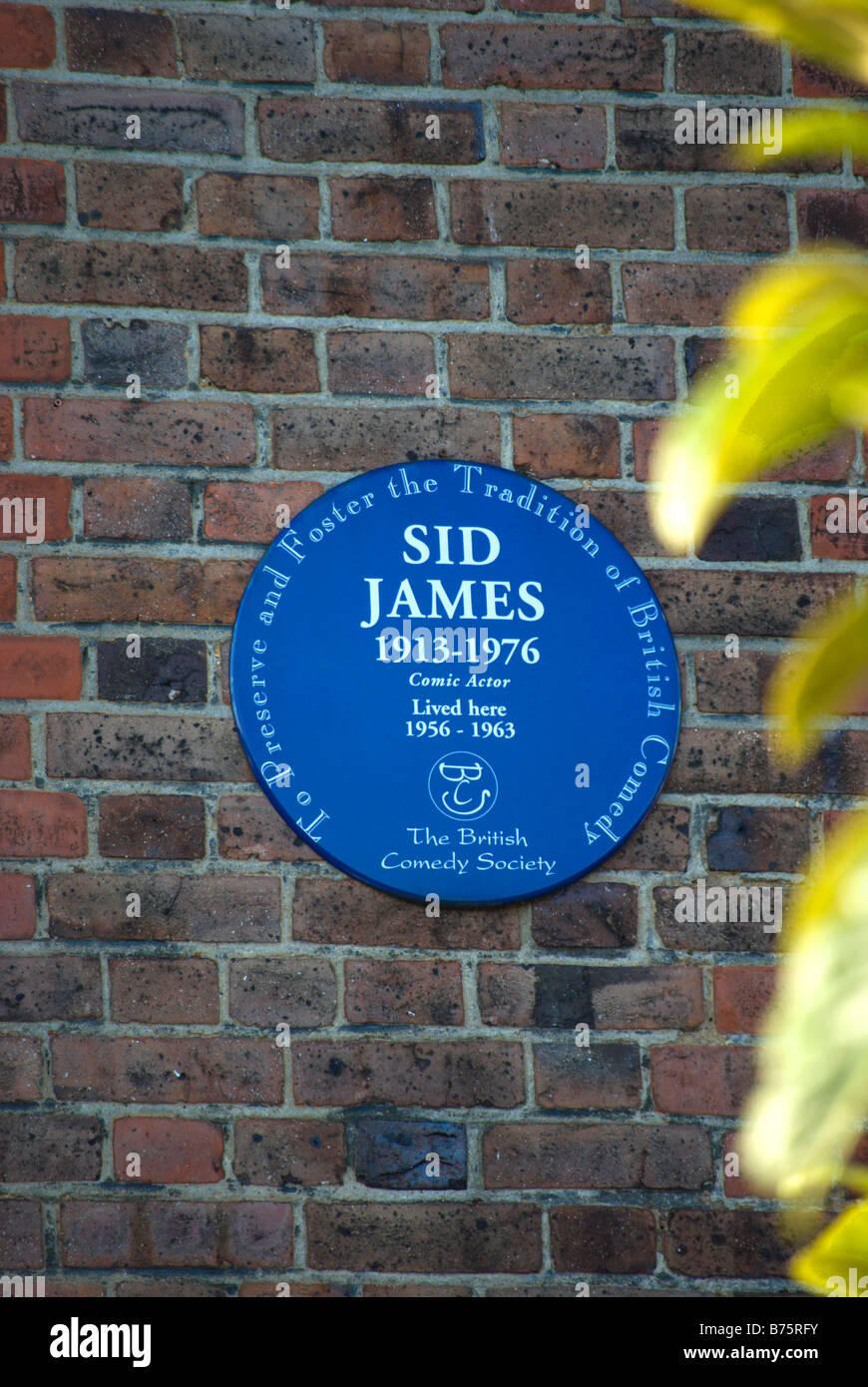 british comedy society blue plaque marking a former home of comic actor sid james, ealing, west london, england Stock Photo