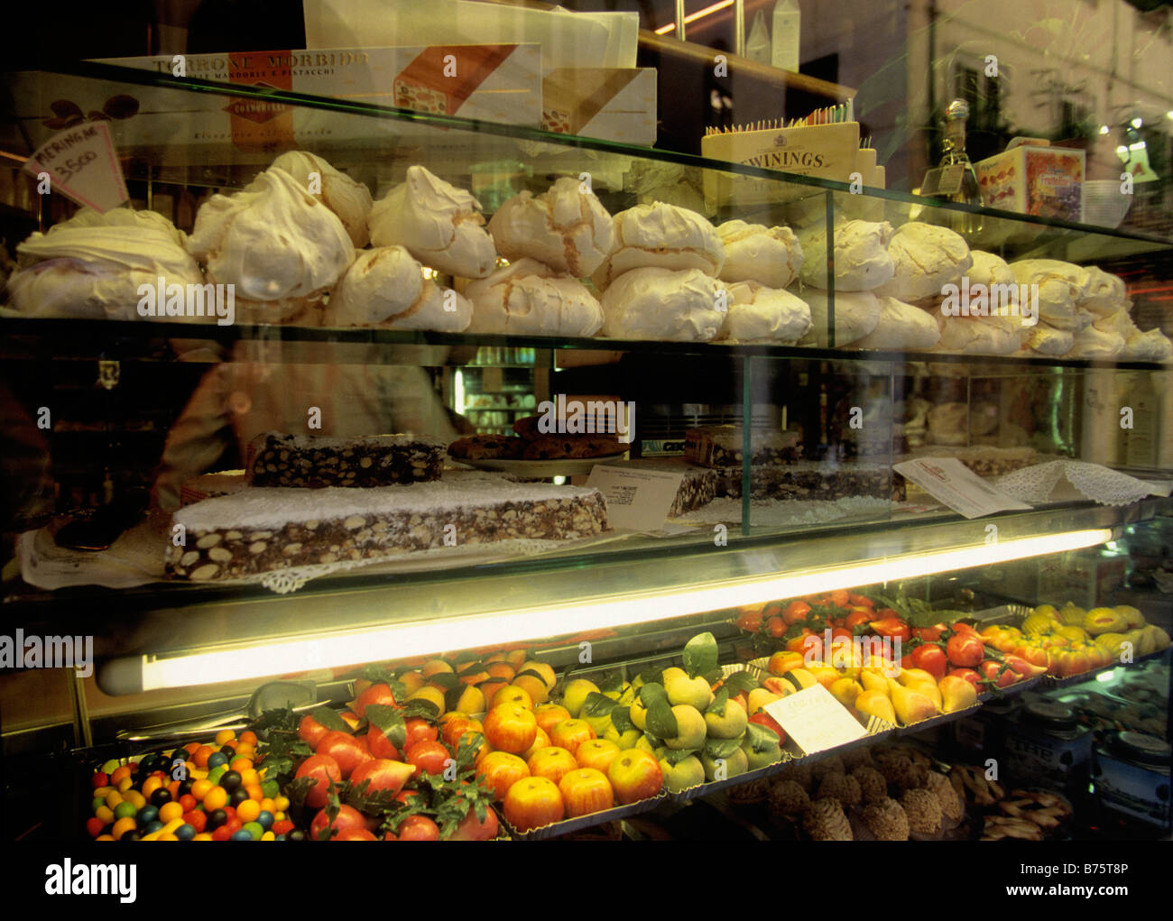 Store food display. Shop interior. Europe, Italy, Florence, Firenze, Tuscany. Specialty  take out meals. Delicacies counter in store. Stock Photo
