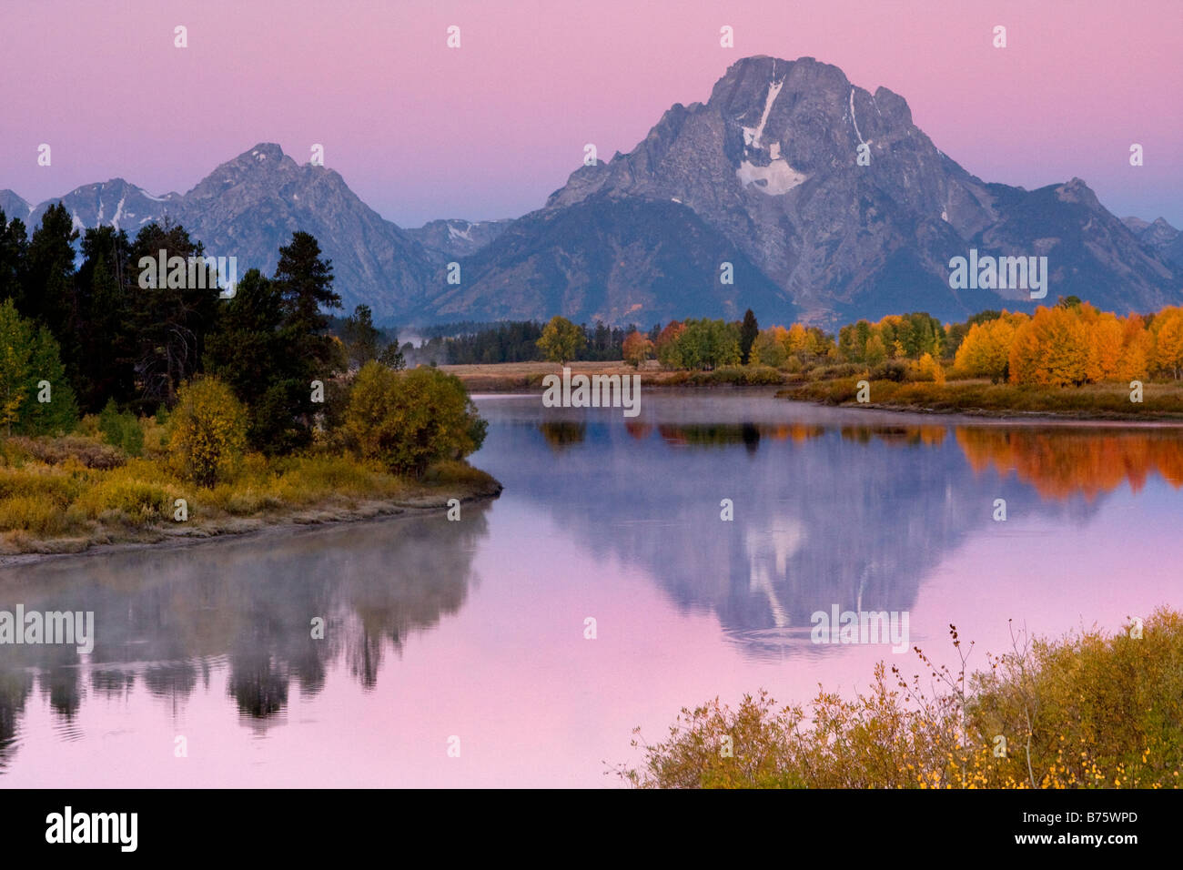 Mount Moran reflected in the ancestral waters of the Snake River at Oxbow Bend in Grand Teton National Park Wyoming Stock Photo