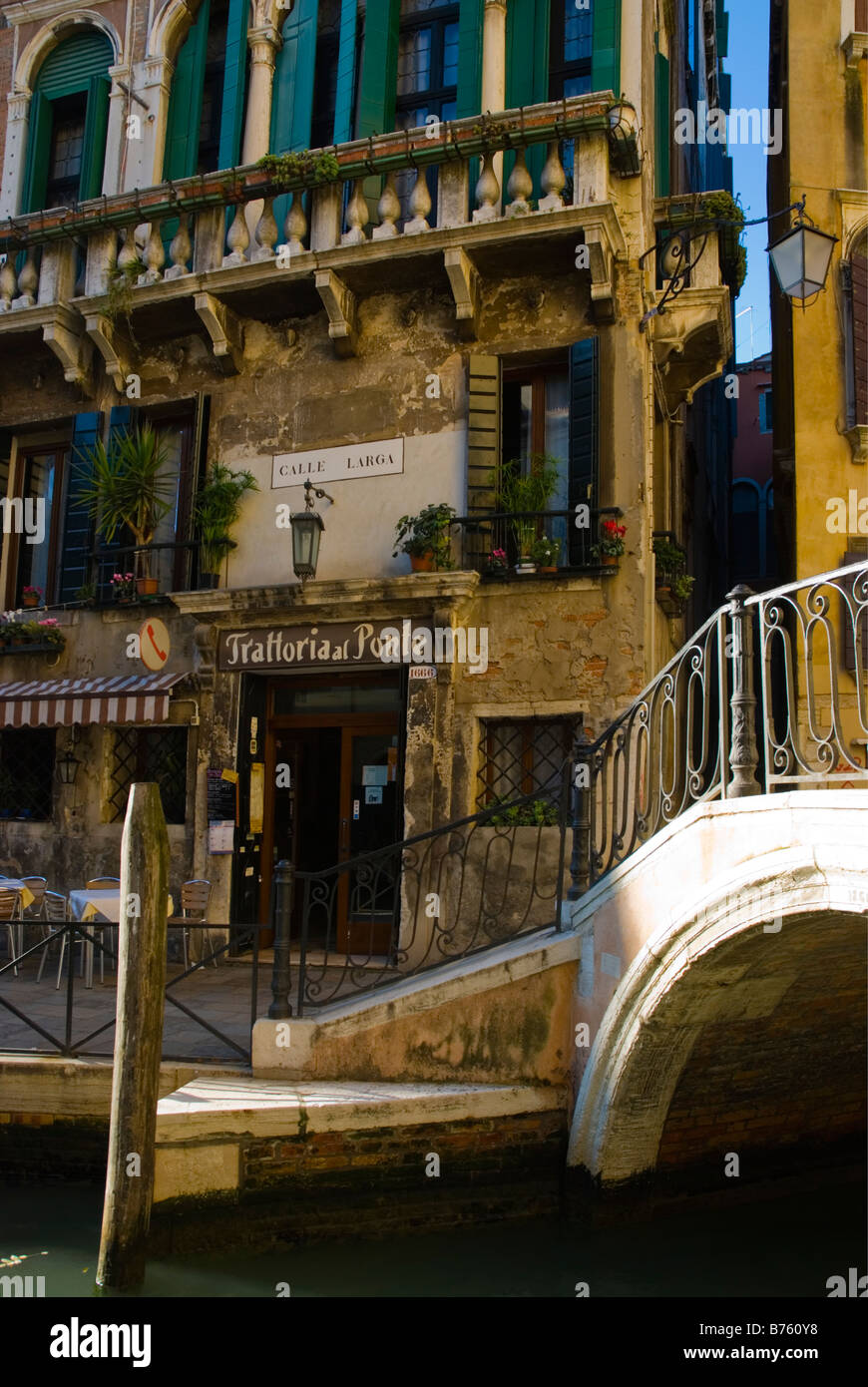 Trattoria al Ponte by a bridge along Calle Largo in Venice Italy Europe Stock Photo