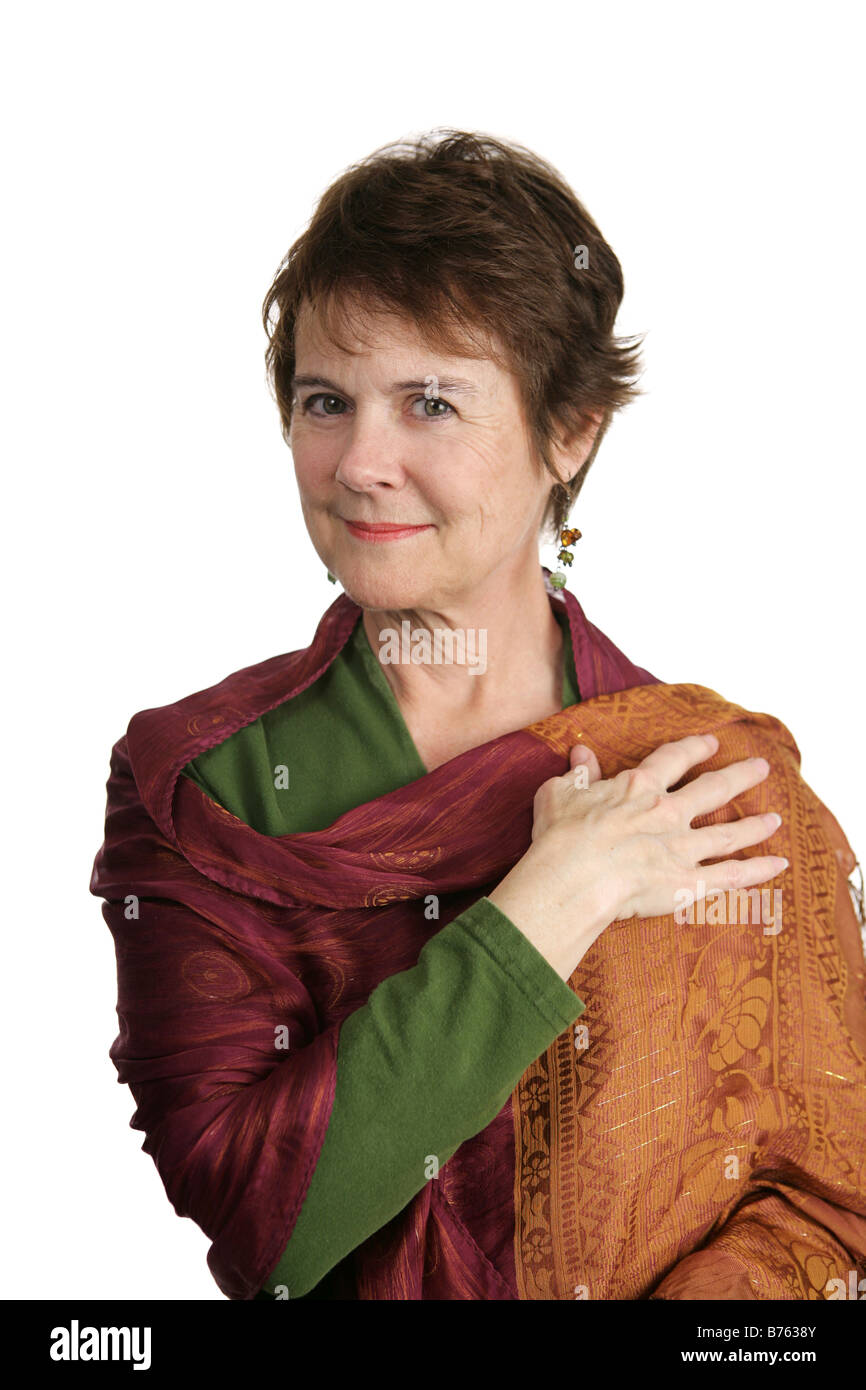 A beautiful mature Irish woman wearing a colorful shawl Isolated on white Stock Photo