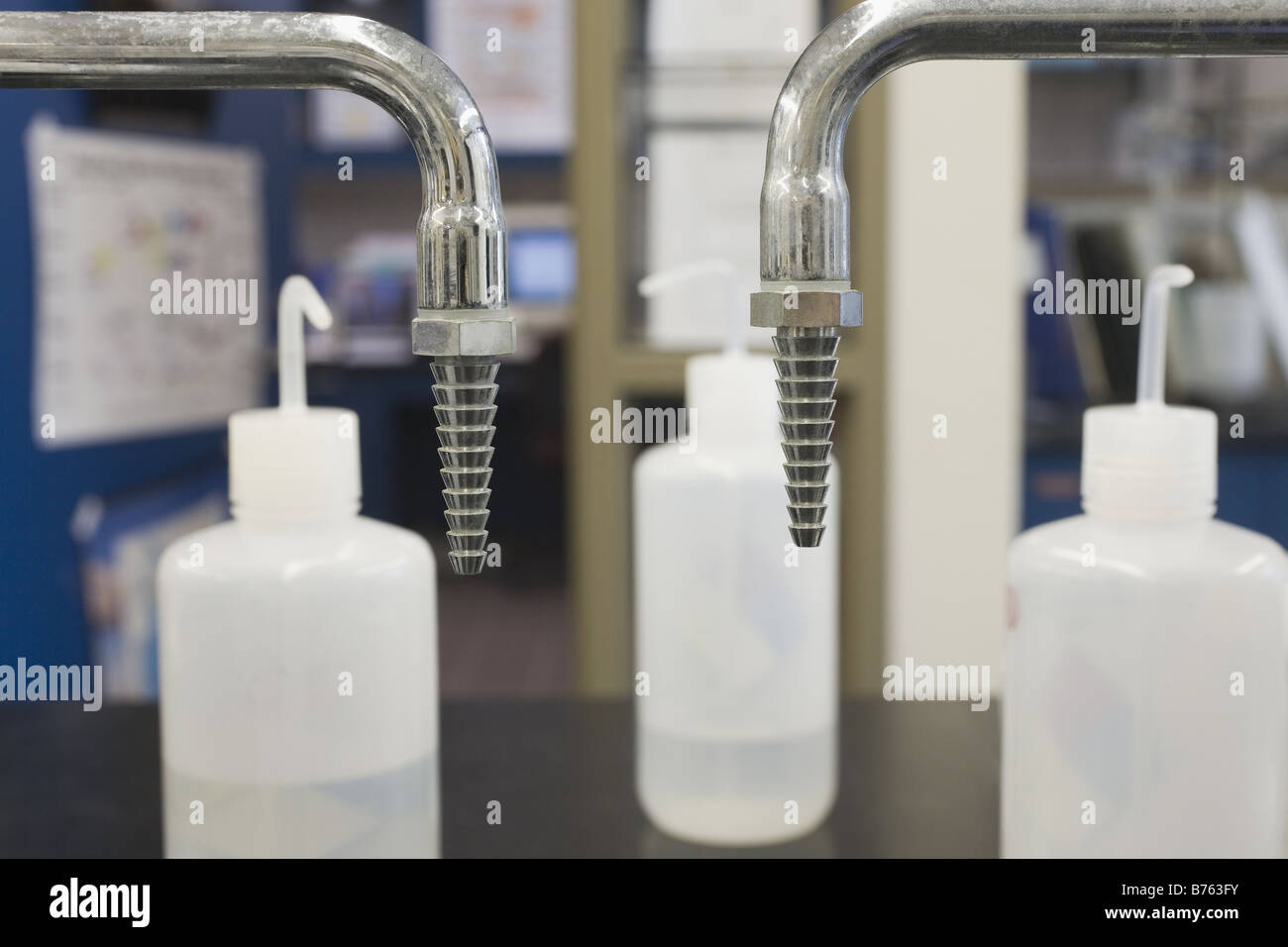 Plastic rinse bottles with faucets in a laboratory Stock Photo Alamy