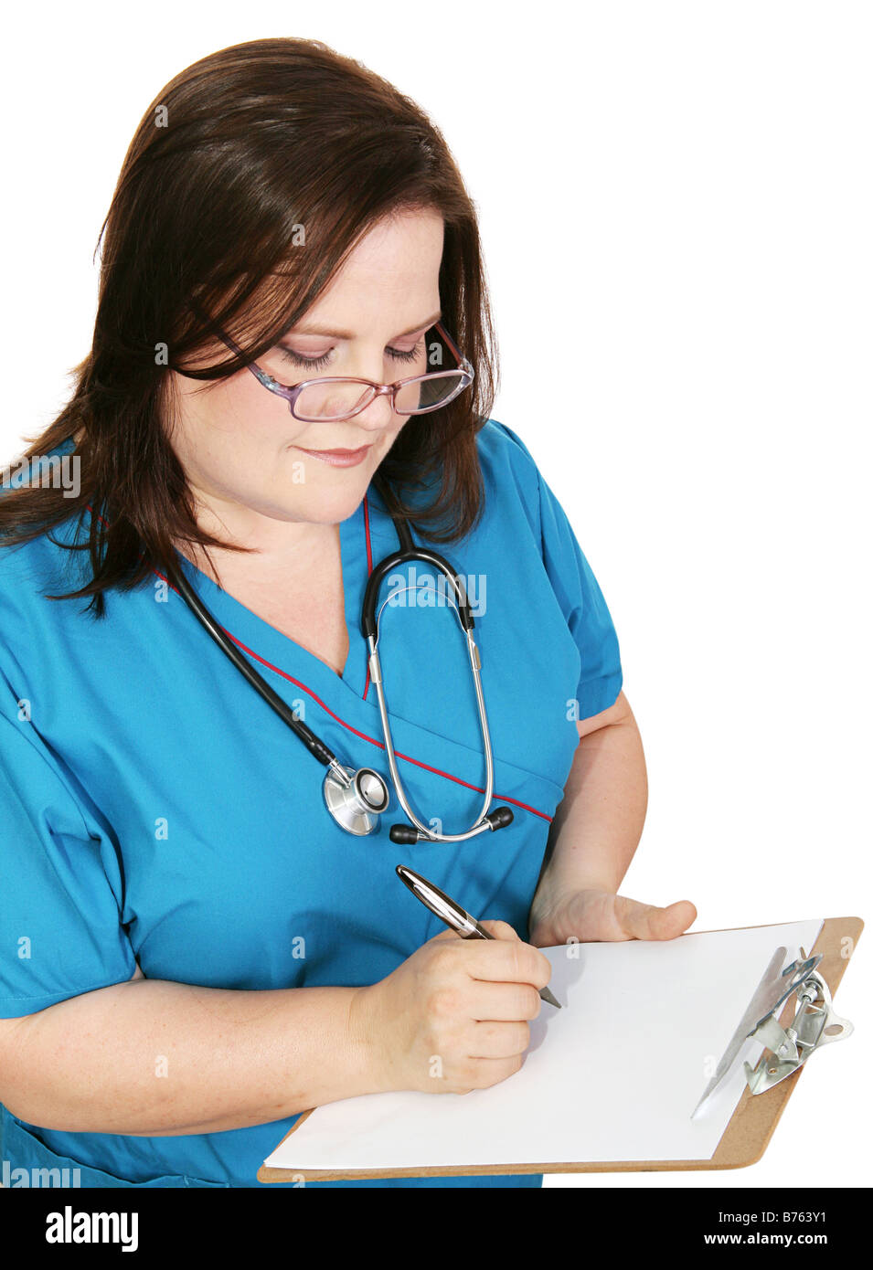 Nurse in scrubs taking notes Page left blank for your text Isolated on ...