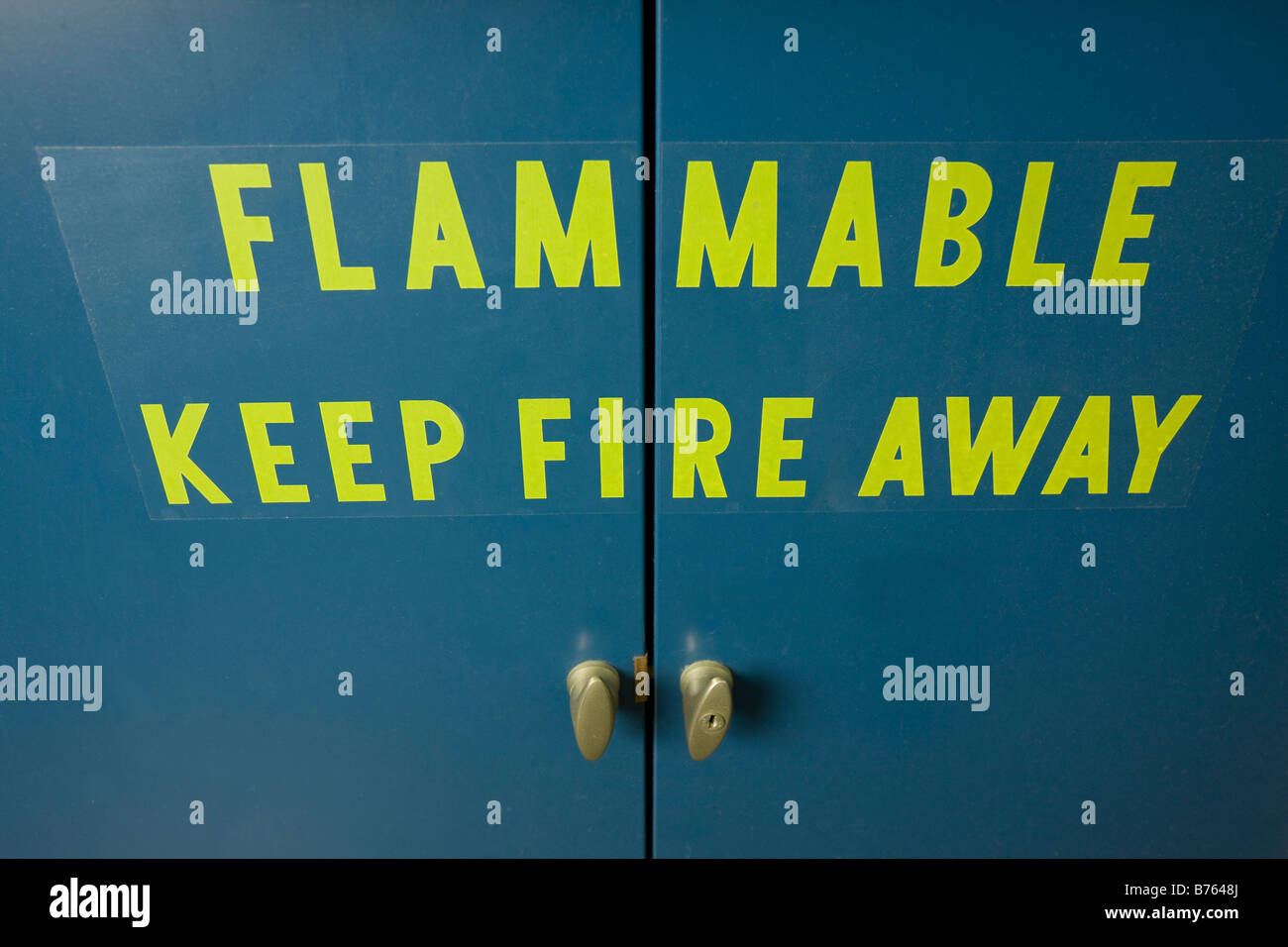 Weaning on ventilated flammable cabinet door Stock Photo