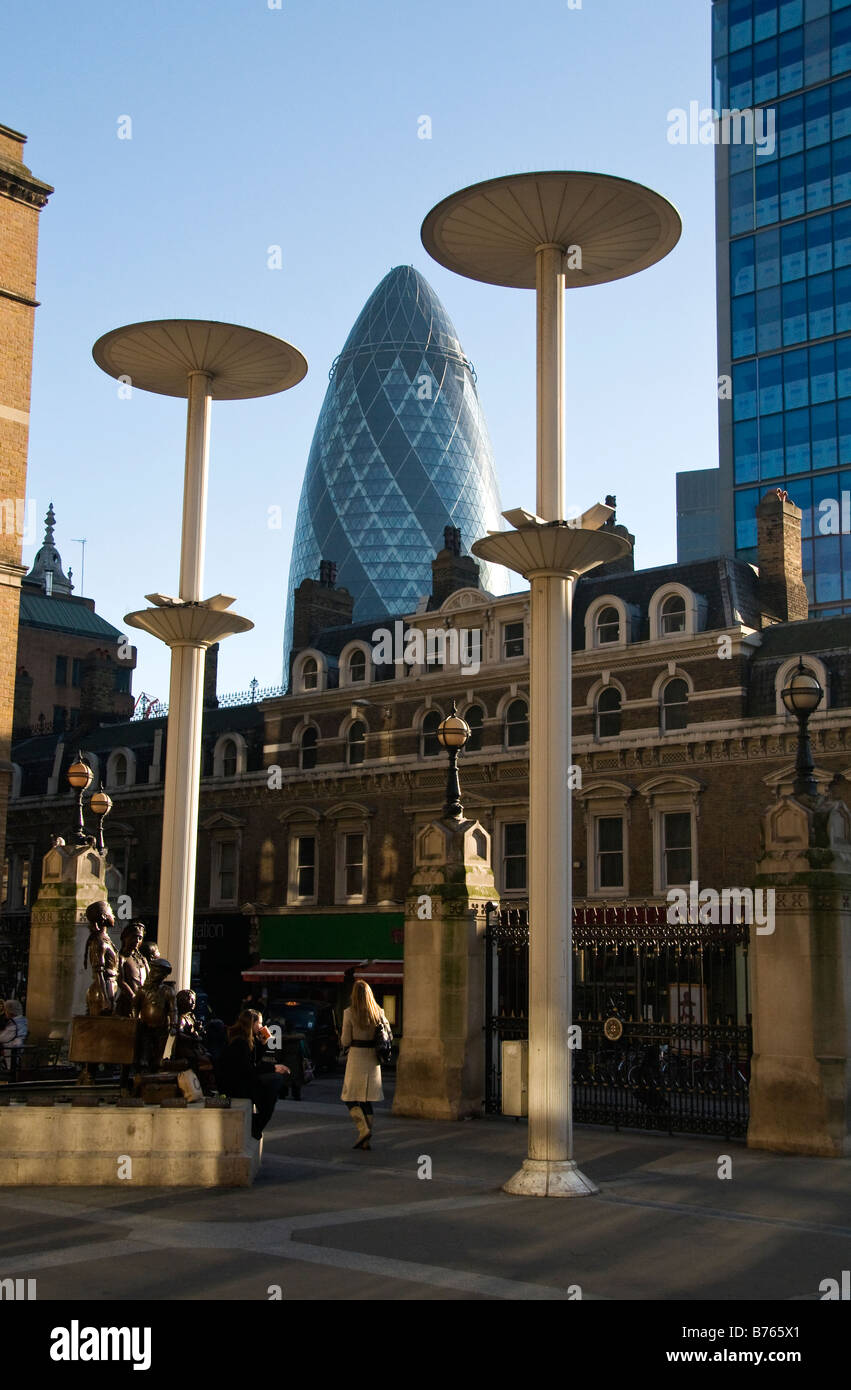 Gherkin or Swiss Re Tower as seen from the outside of the Liverpool Street station, London, UK Stock Photo