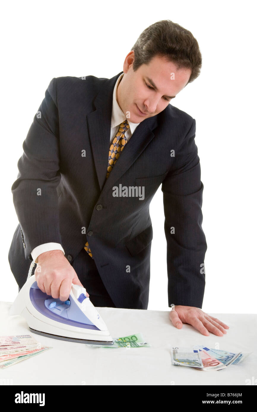 businessman ironing money Stock Photo Alamy