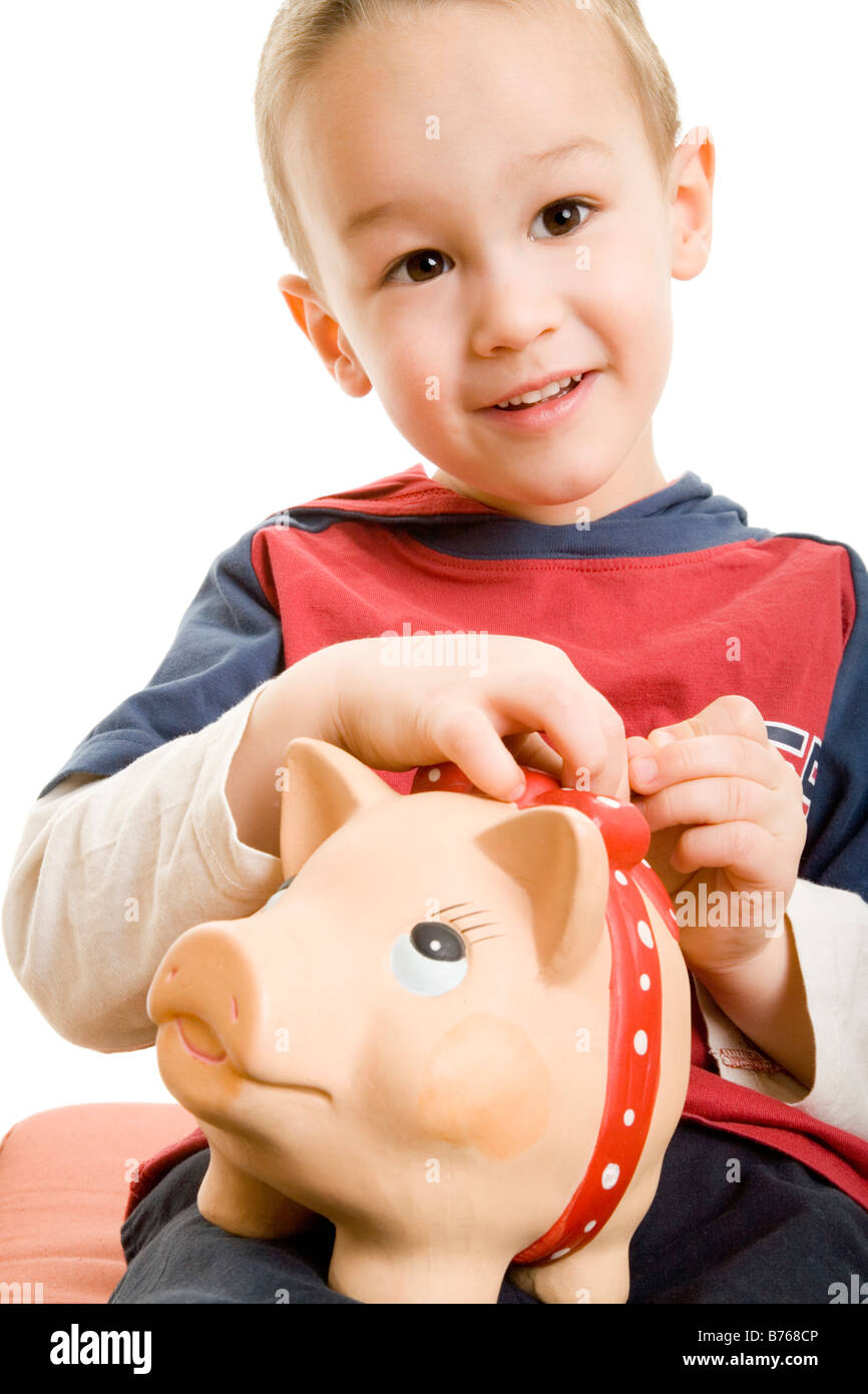 little boy with piggybank Stock Photo