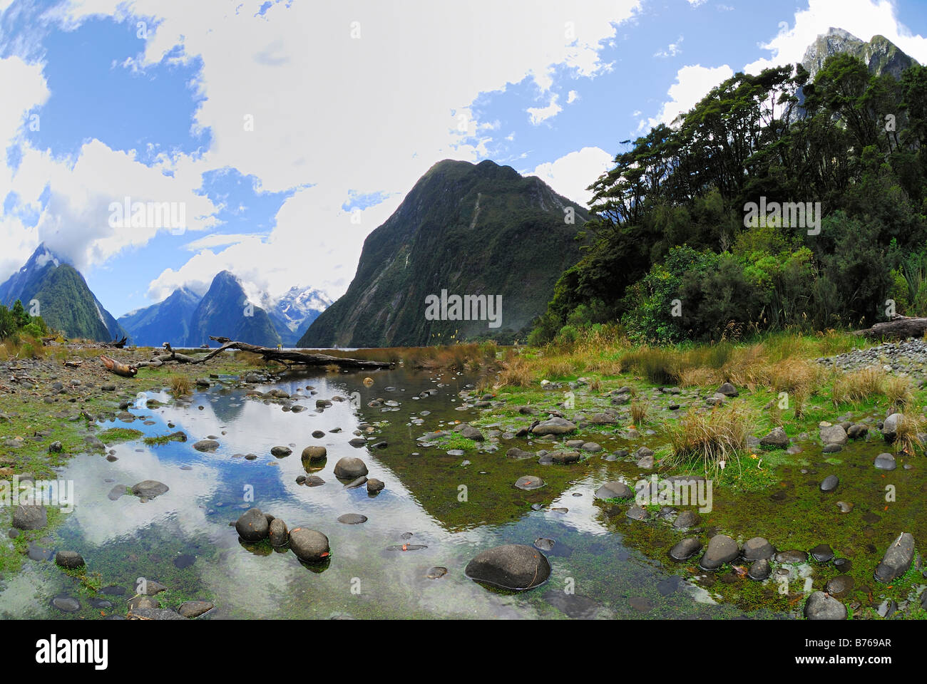Milford Sound Fiordland National park South West New Zealand landscape scenery river bay Stock Photo
