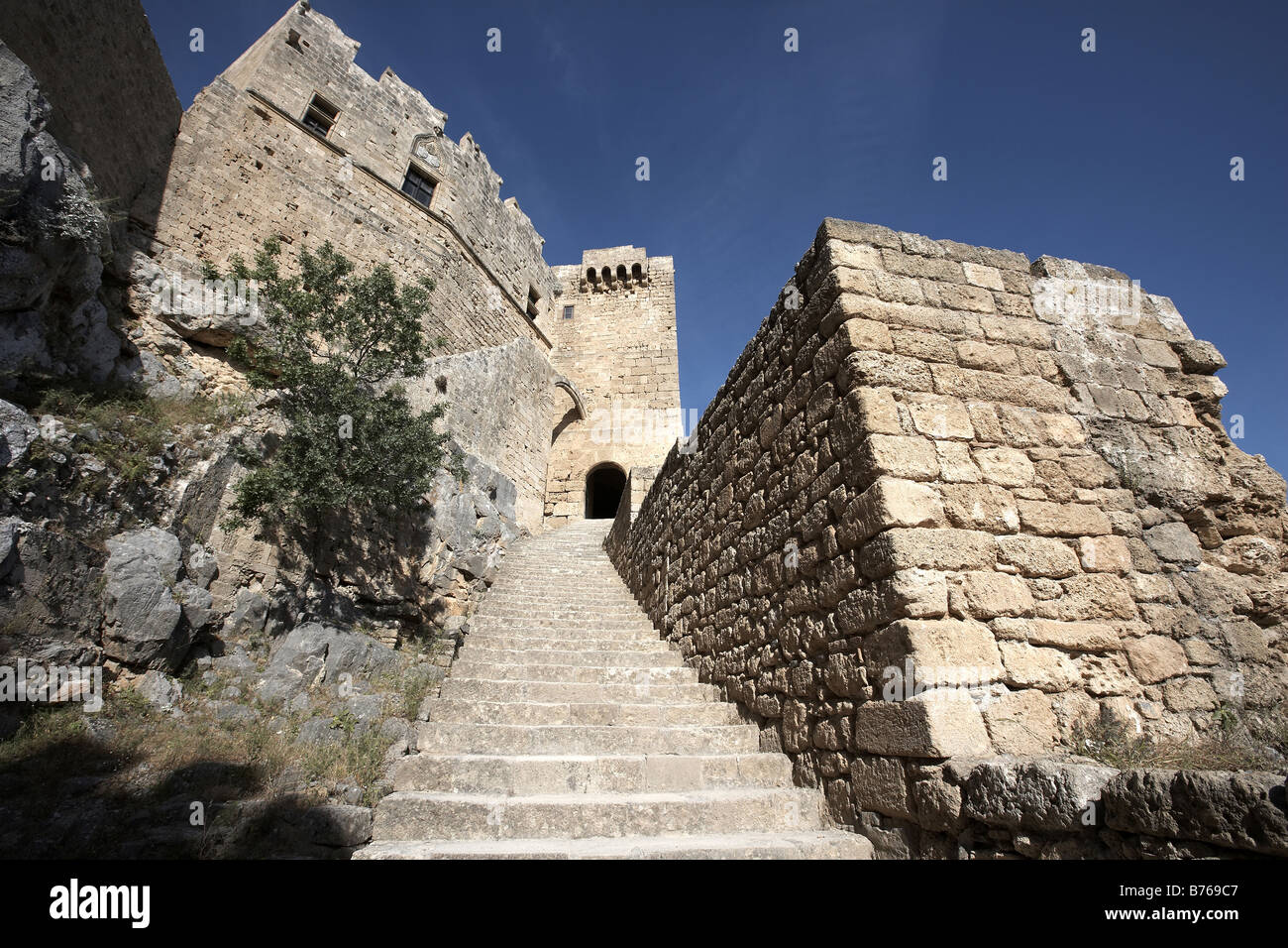 Steps up to the fort within the Acropolis Lindos Island of Rhodes Dodekanes Greece Stock Photo