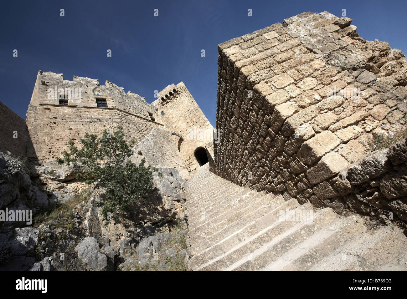 Steps up to the fort within the Acropolis Lindos Island of Rhodes Dodekanes Greece Stock Photo