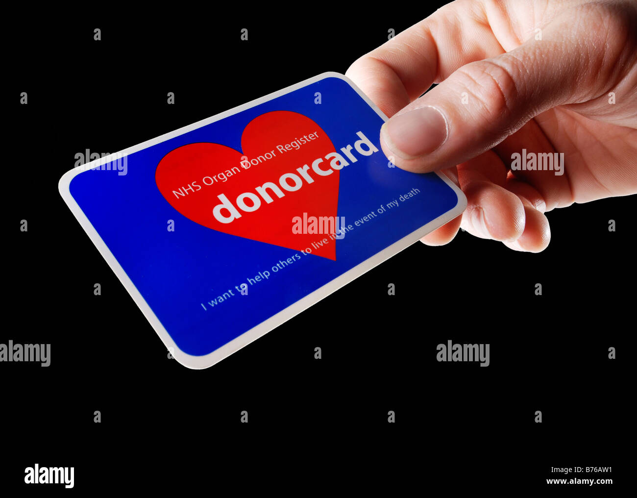 Hand Offering Organ Donor Card Stock Photo Alamy