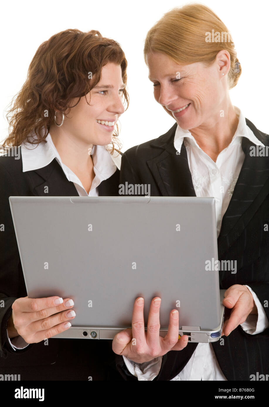two happy businesswoman woman women laptop Stock Photo
