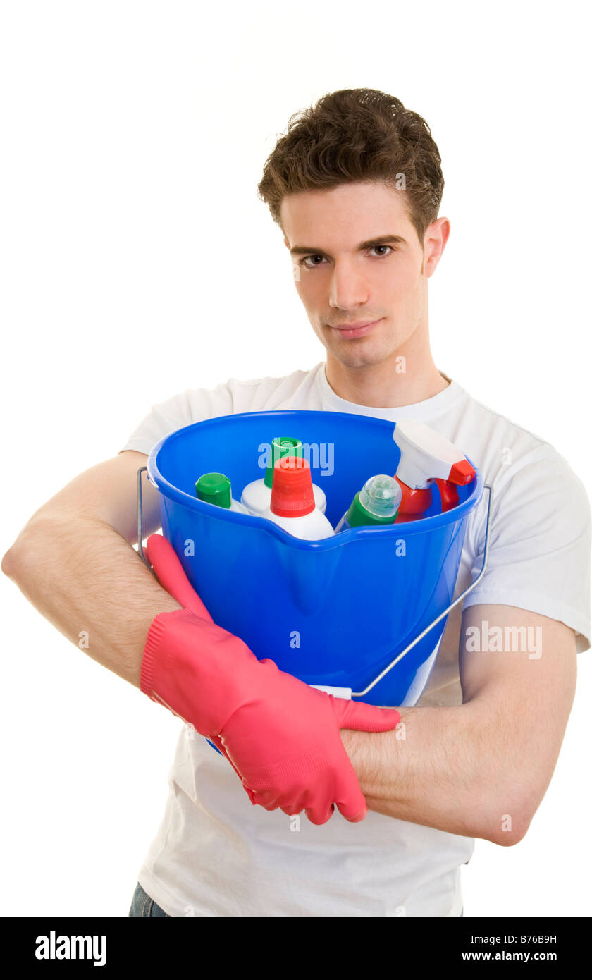 young man does housework Stock Photo