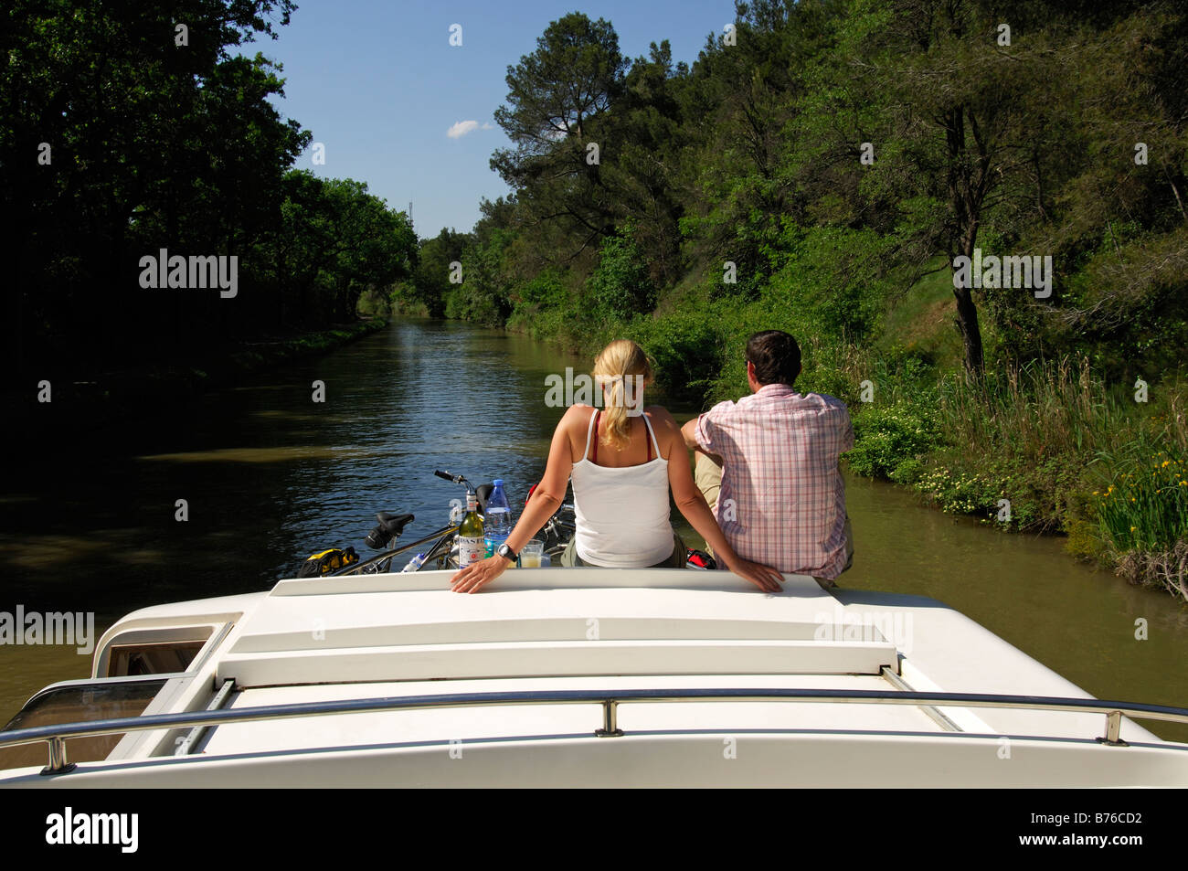 young couple on deck Yacht Canal du Midi MR Stock Photo