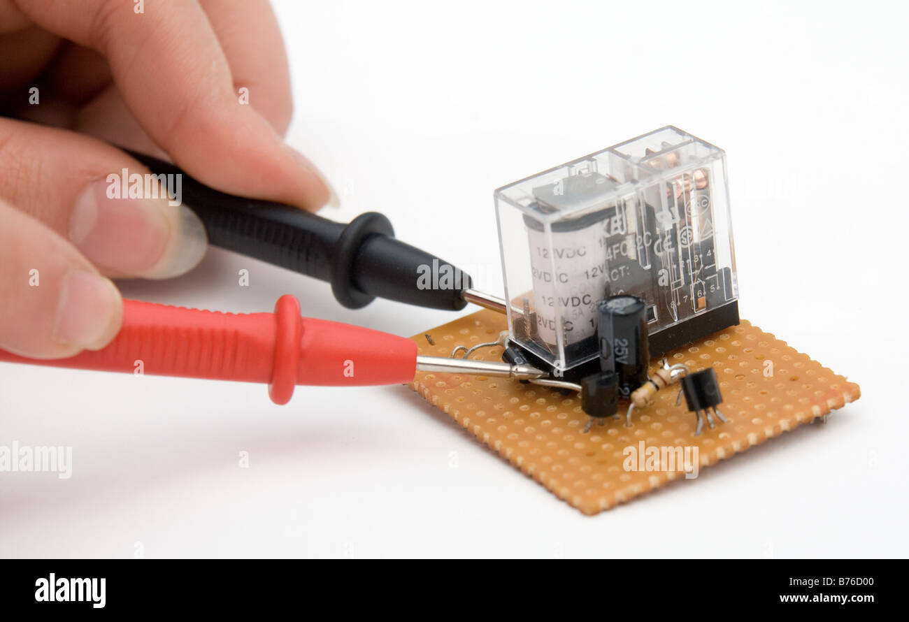 Testing circuit board with multimeter terminals Stock Photo Alamy