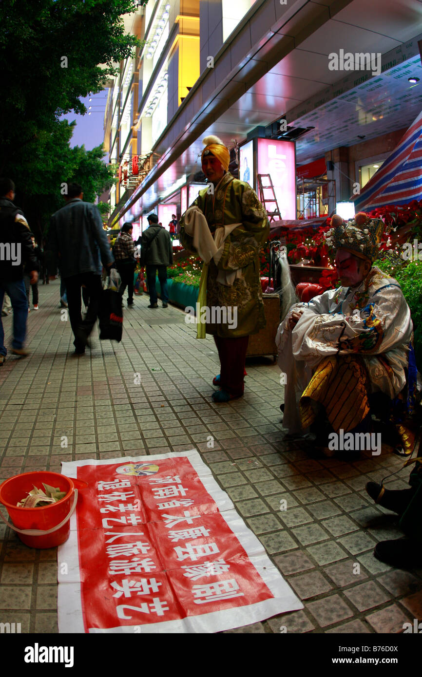 elegant Chinese beggars durring global crisis Stock Photo