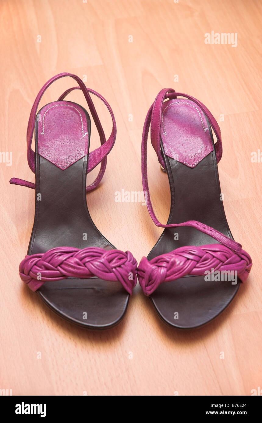 Womans sandals on floor Stock Photo