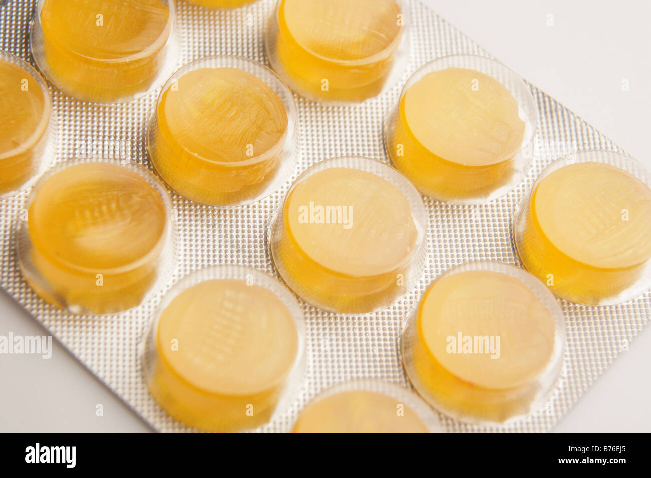 yellow tablets in plastic pack Stock Photo Alamy