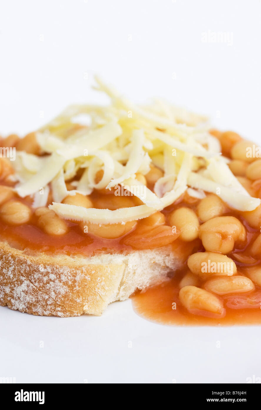 Beans on toast with cheese on top Stock Photo